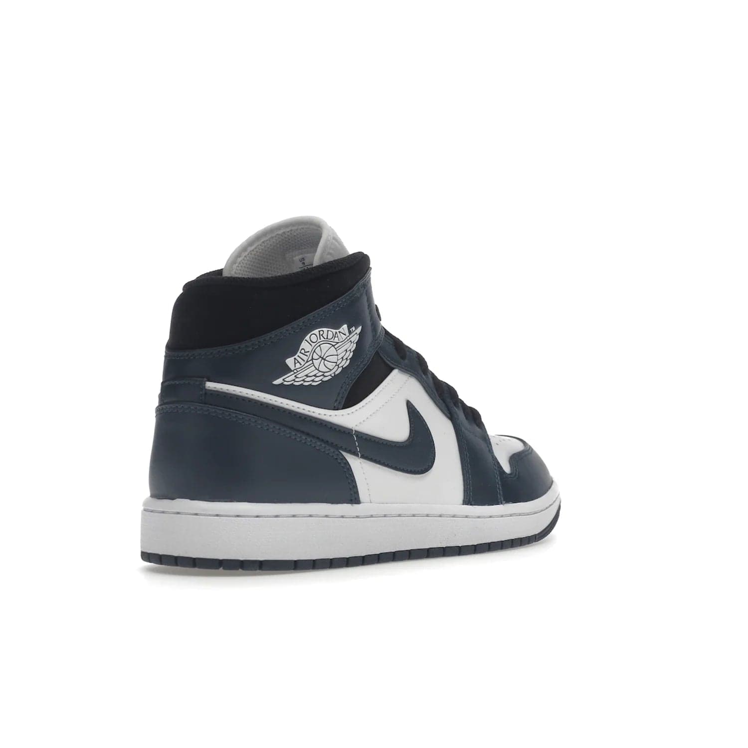 Jordan 1 Mid Armory Navy - Image 32 - Only at www.BallersClubKickz.com - The Jordan 1 Mid Armory Navy: classic basketball sneaker with soft white leather upper, deep navy blue overlays, and black leather ankle detailing. Iconic style with Jordan Wings logo and Jumpman label.