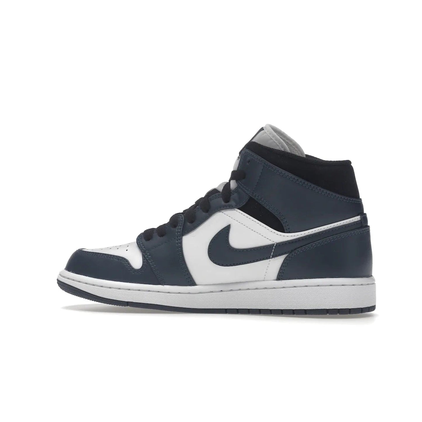 Jordan 1 Mid Armory Navy - Image 21 - Only at www.BallersClubKickz.com - The Jordan 1 Mid Armory Navy: classic basketball sneaker with soft white leather upper, deep navy blue overlays, and black leather ankle detailing. Iconic style with Jordan Wings logo and Jumpman label.