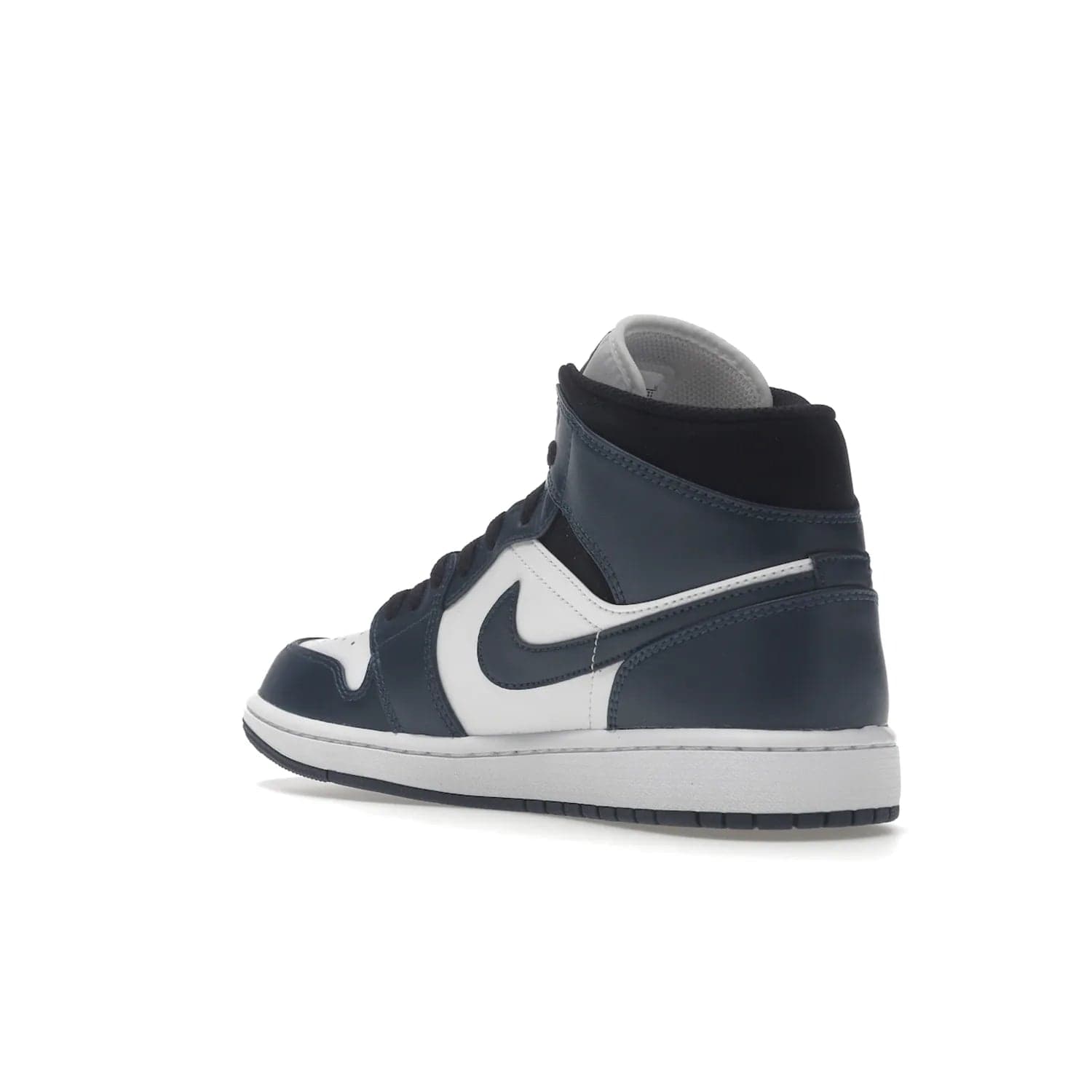 Jordan 1 Mid Armory Navy - Image 24 - Only at www.BallersClubKickz.com - The Jordan 1 Mid Armory Navy: classic basketball sneaker with soft white leather upper, deep navy blue overlays, and black leather ankle detailing. Iconic style with Jordan Wings logo and Jumpman label.