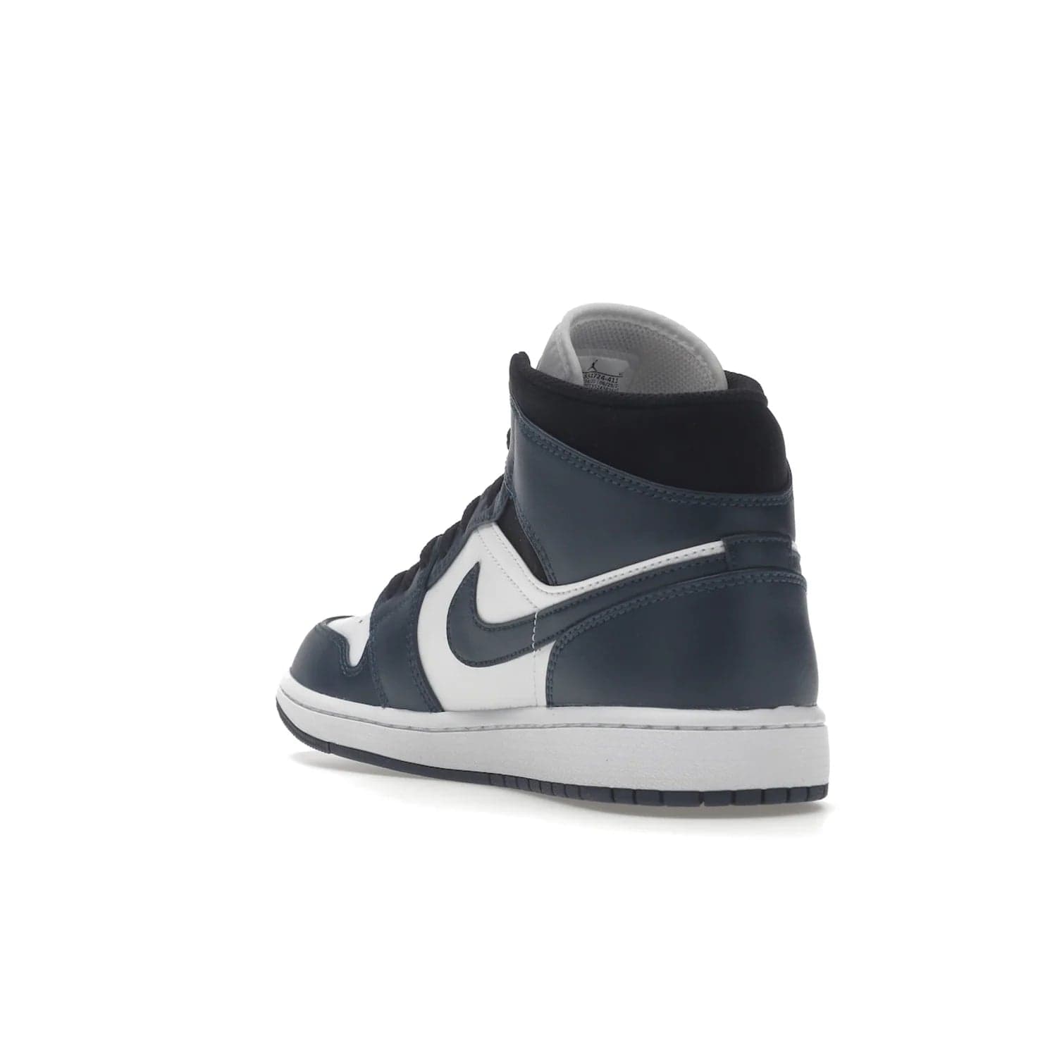 Jordan 1 Mid Armory Navy - Image 25 - Only at www.BallersClubKickz.com - The Jordan 1 Mid Armory Navy: classic basketball sneaker with soft white leather upper, deep navy blue overlays, and black leather ankle detailing. Iconic style with Jordan Wings logo and Jumpman label.