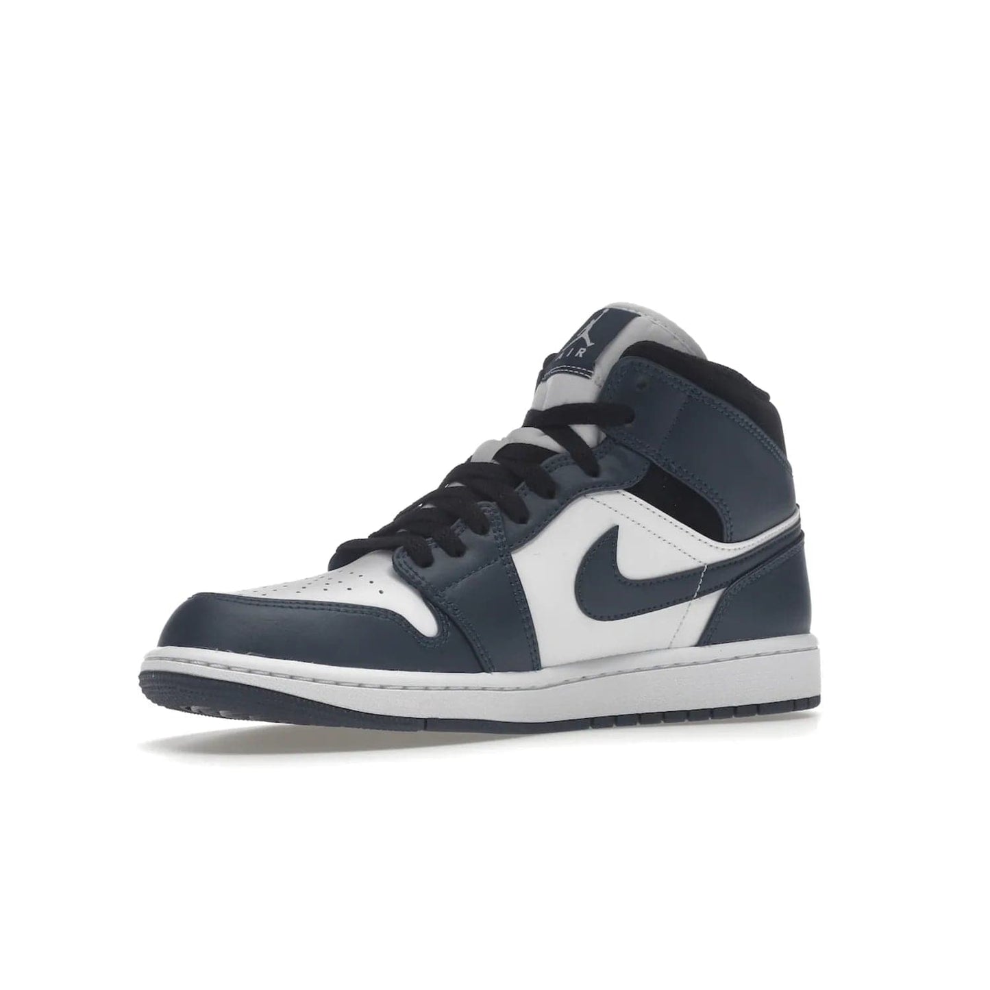 Jordan 1 Mid Armory Navy - Image 16 - Only at www.BallersClubKickz.com - The Jordan 1 Mid Armory Navy: classic basketball sneaker with soft white leather upper, deep navy blue overlays, and black leather ankle detailing. Iconic style with Jordan Wings logo and Jumpman label.