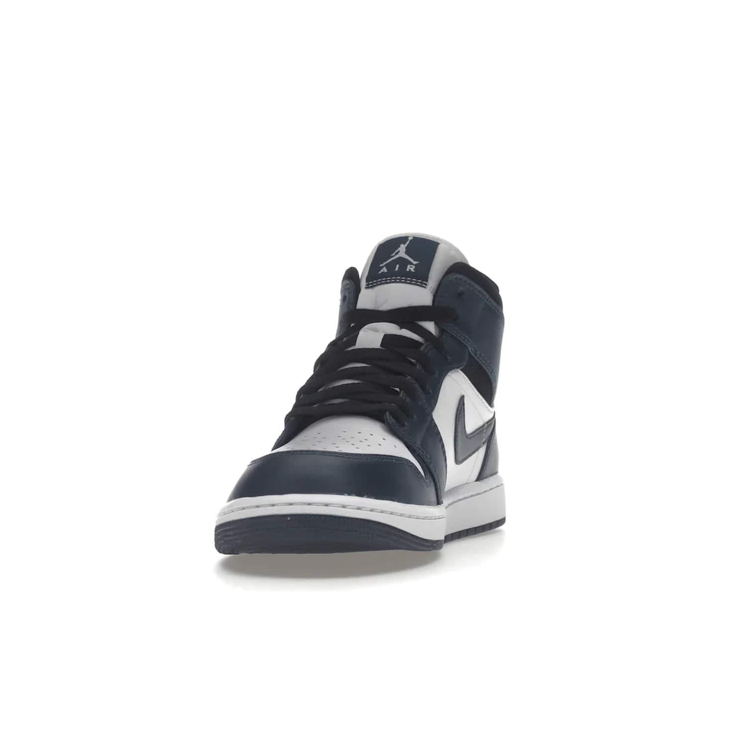 Jordan 1 Mid Armory Navy - Image 12 - Only at www.BallersClubKickz.com - The Jordan 1 Mid Armory Navy: classic basketball sneaker with soft white leather upper, deep navy blue overlays, and black leather ankle detailing. Iconic style with Jordan Wings logo and Jumpman label.
