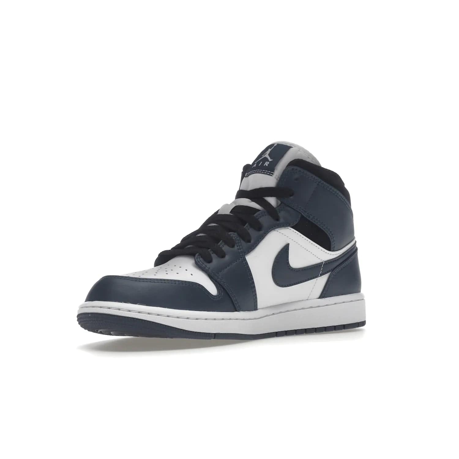 Jordan 1 Mid Armory Navy - Image 15 - Only at www.BallersClubKickz.com - The Jordan 1 Mid Armory Navy: classic basketball sneaker with soft white leather upper, deep navy blue overlays, and black leather ankle detailing. Iconic style with Jordan Wings logo and Jumpman label.