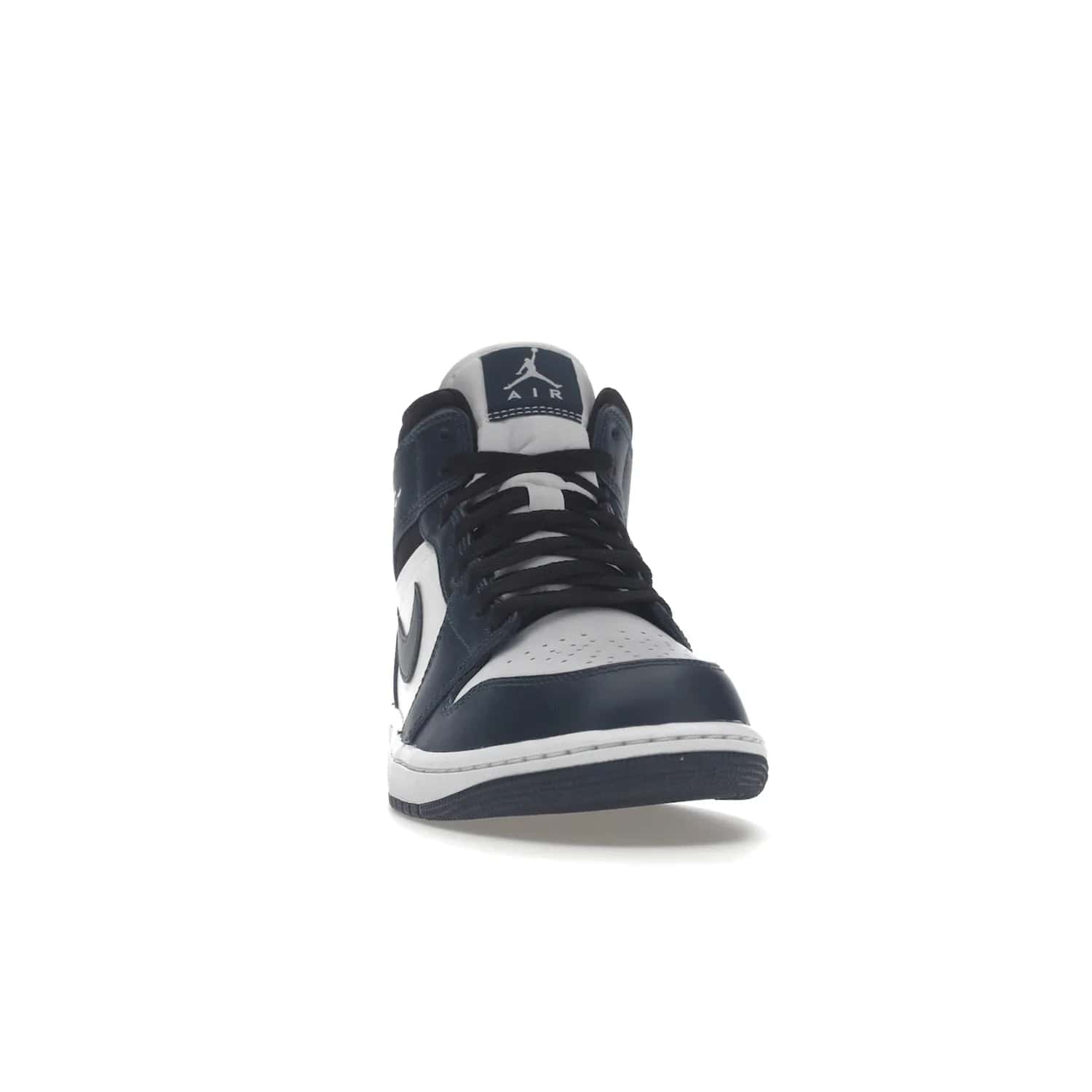 Jordan 1 Mid Armory Navy - Image 9 - Only at www.BallersClubKickz.com - The Jordan 1 Mid Armory Navy: classic basketball sneaker with soft white leather upper, deep navy blue overlays, and black leather ankle detailing. Iconic style with Jordan Wings logo and Jumpman label.
