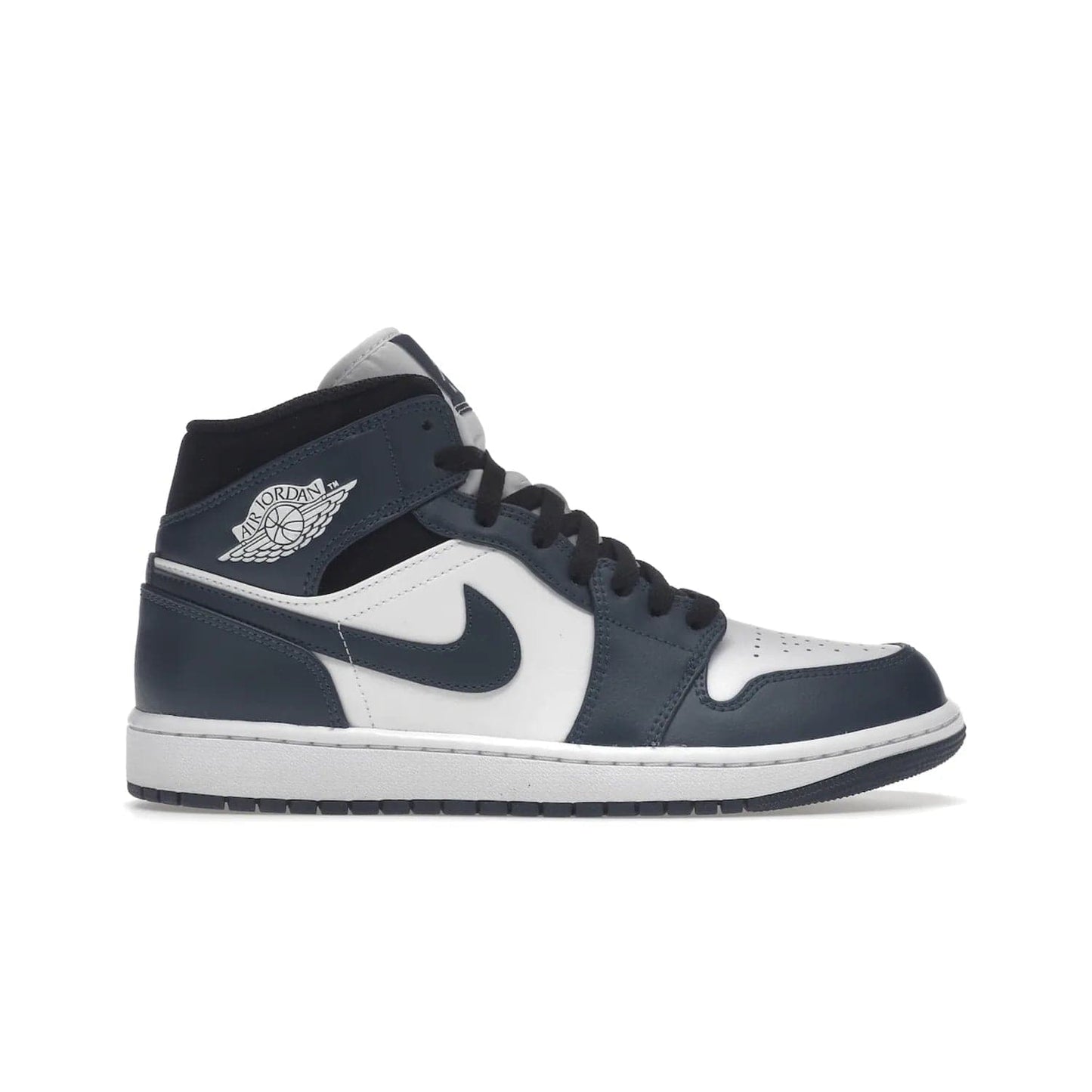 Jordan 1 Mid Armory Navy - Image 1 - Only at www.BallersClubKickz.com - The Jordan 1 Mid Armory Navy: classic basketball sneaker with soft white leather upper, deep navy blue overlays, and black leather ankle detailing. Iconic style with Jordan Wings logo and Jumpman label.