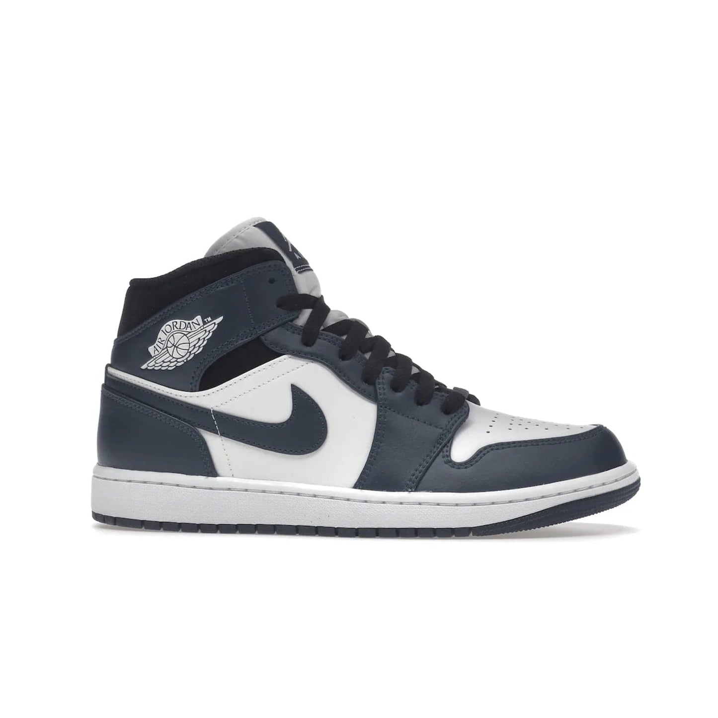 Jordan 1 Mid Armory Navy - Image 2 - Only at www.BallersClubKickz.com - The Jordan 1 Mid Armory Navy: classic basketball sneaker with soft white leather upper, deep navy blue overlays, and black leather ankle detailing. Iconic style with Jordan Wings logo and Jumpman label.