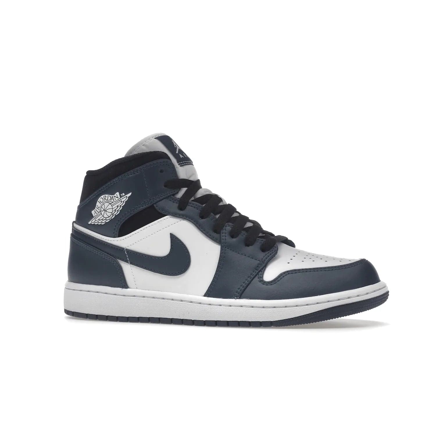 Jordan 1 Mid Armory Navy - Image 3 - Only at www.BallersClubKickz.com - The Jordan 1 Mid Armory Navy: classic basketball sneaker with soft white leather upper, deep navy blue overlays, and black leather ankle detailing. Iconic style with Jordan Wings logo and Jumpman label.