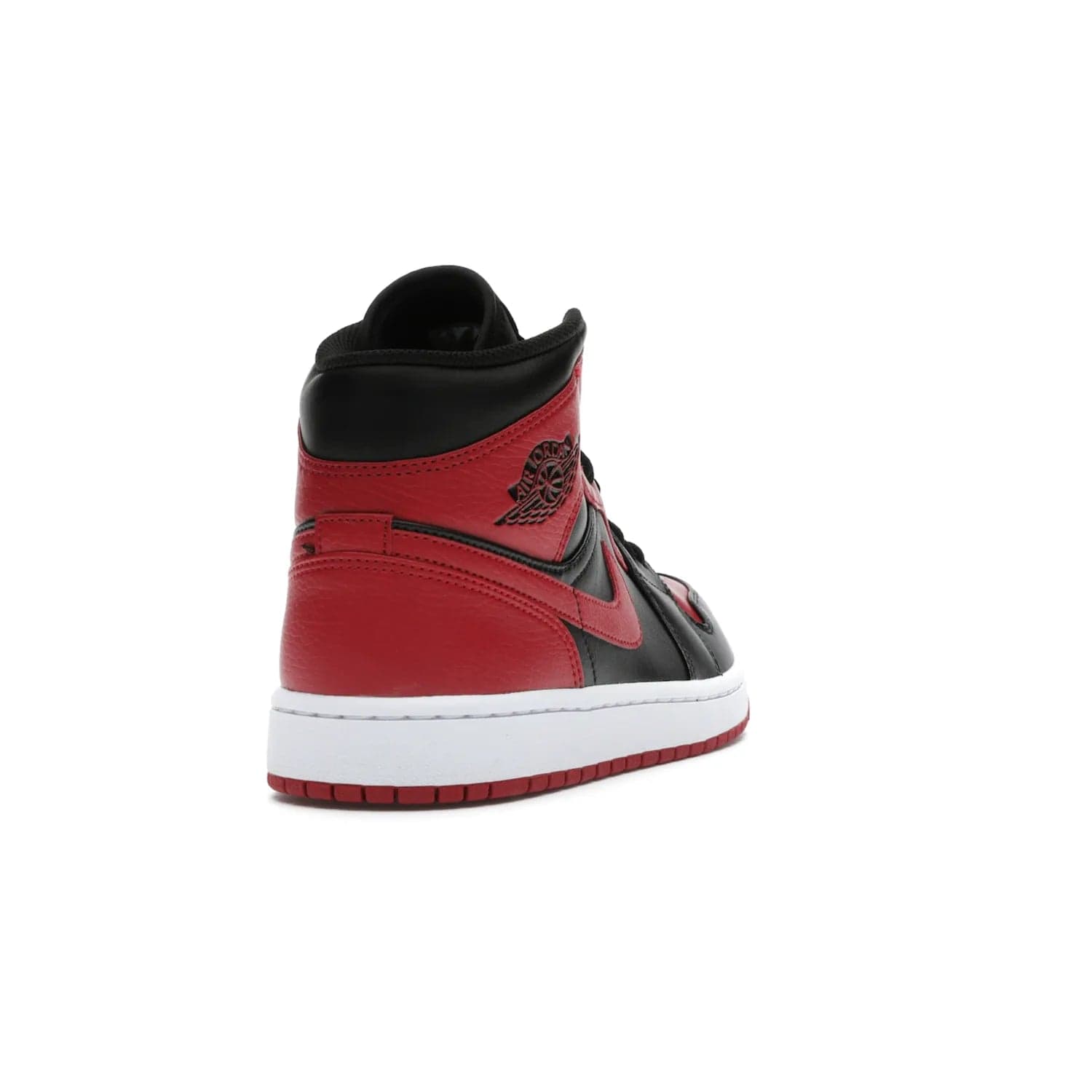Jordan 1 Mid Banned (2020) - Image 30 - Only at www.BallersClubKickz.com - The Air Jordan 1 Mid Banned (2020) brings a modern twist to the classic Banned colorway. Features full-grain black and red leather uppers, red leather around the toe, collar, heel, & Swoosh. Release November 2021 for $110.