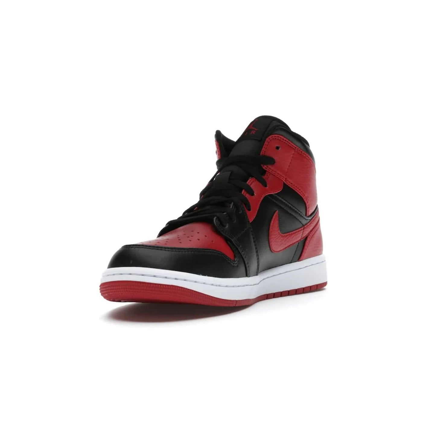 Jordan 1 Mid Banned (2020) - Image 13 - Only at www.BallersClubKickz.com - The Air Jordan 1 Mid Banned (2020) brings a modern twist to the classic Banned colorway. Features full-grain black and red leather uppers, red leather around the toe, collar, heel, & Swoosh. Release November 2021 for $110.