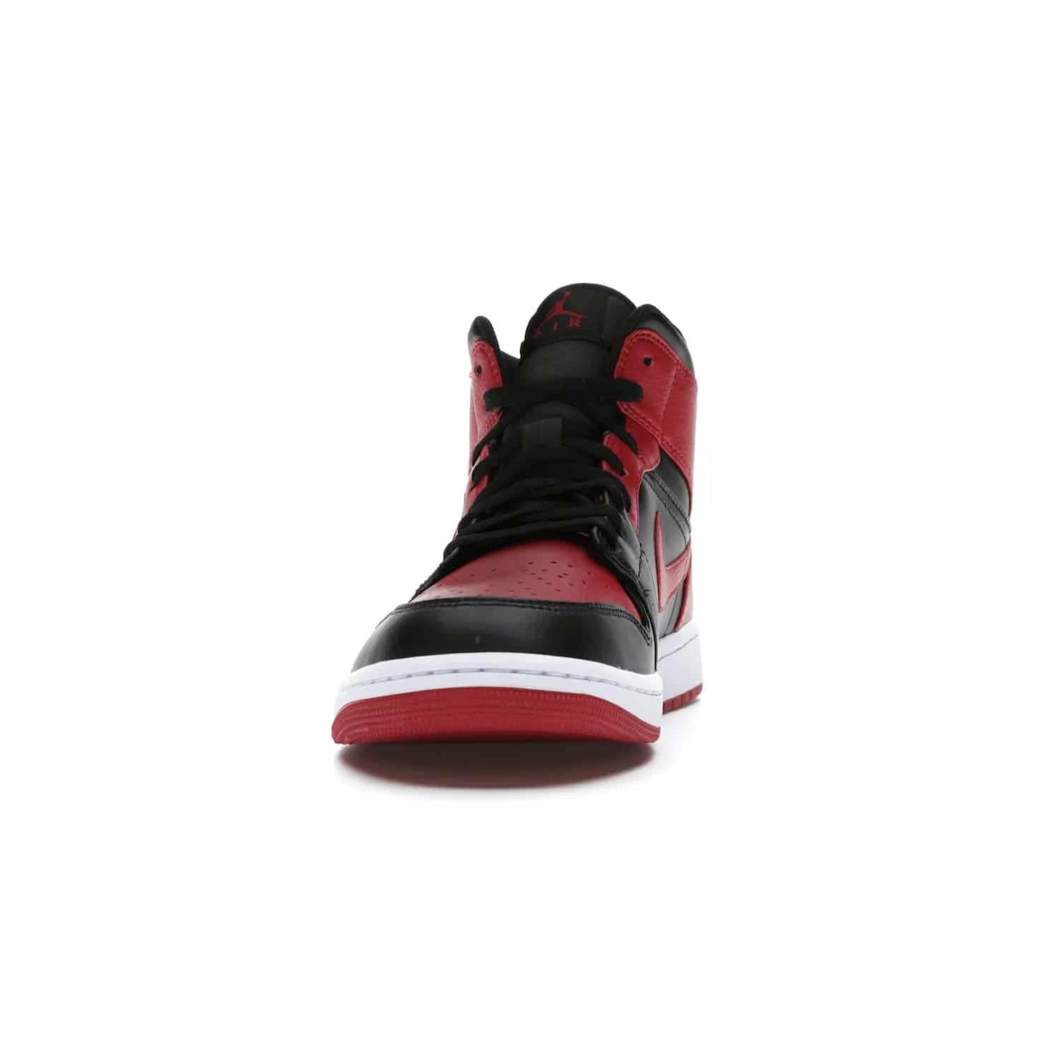 Jordan 1 Mid Banned (2020) - Image 11 - Only at www.BallersClubKickz.com - The Air Jordan 1 Mid Banned (2020) brings a modern twist to the classic Banned colorway. Features full-grain black and red leather uppers, red leather around the toe, collar, heel, & Swoosh. Release November 2021 for $110.