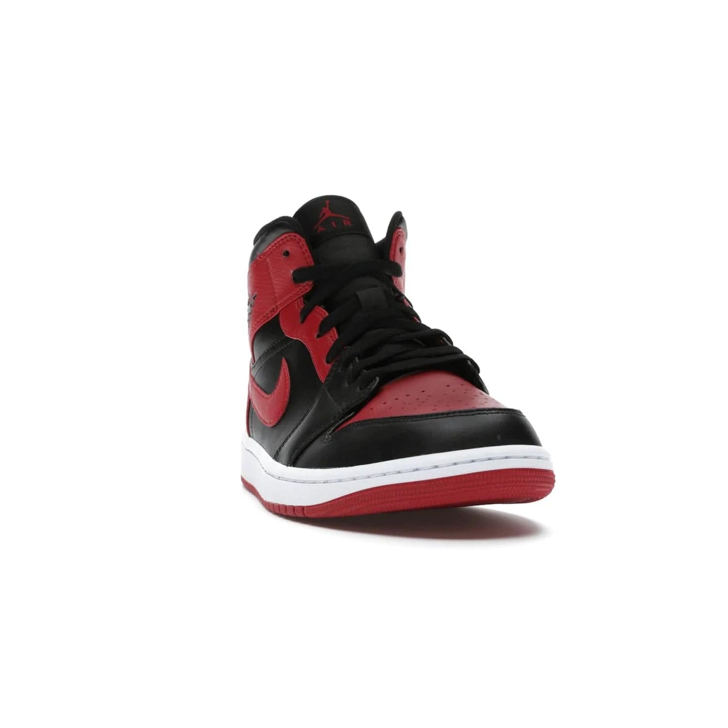 Jordan 1 Mid Banned (2020) - Image 8 - Only at www.BallersClubKickz.com - The Air Jordan 1 Mid Banned (2020) brings a modern twist to the classic Banned colorway. Features full-grain black and red leather uppers, red leather around the toe, collar, heel, & Swoosh. Release November 2021 for $110.