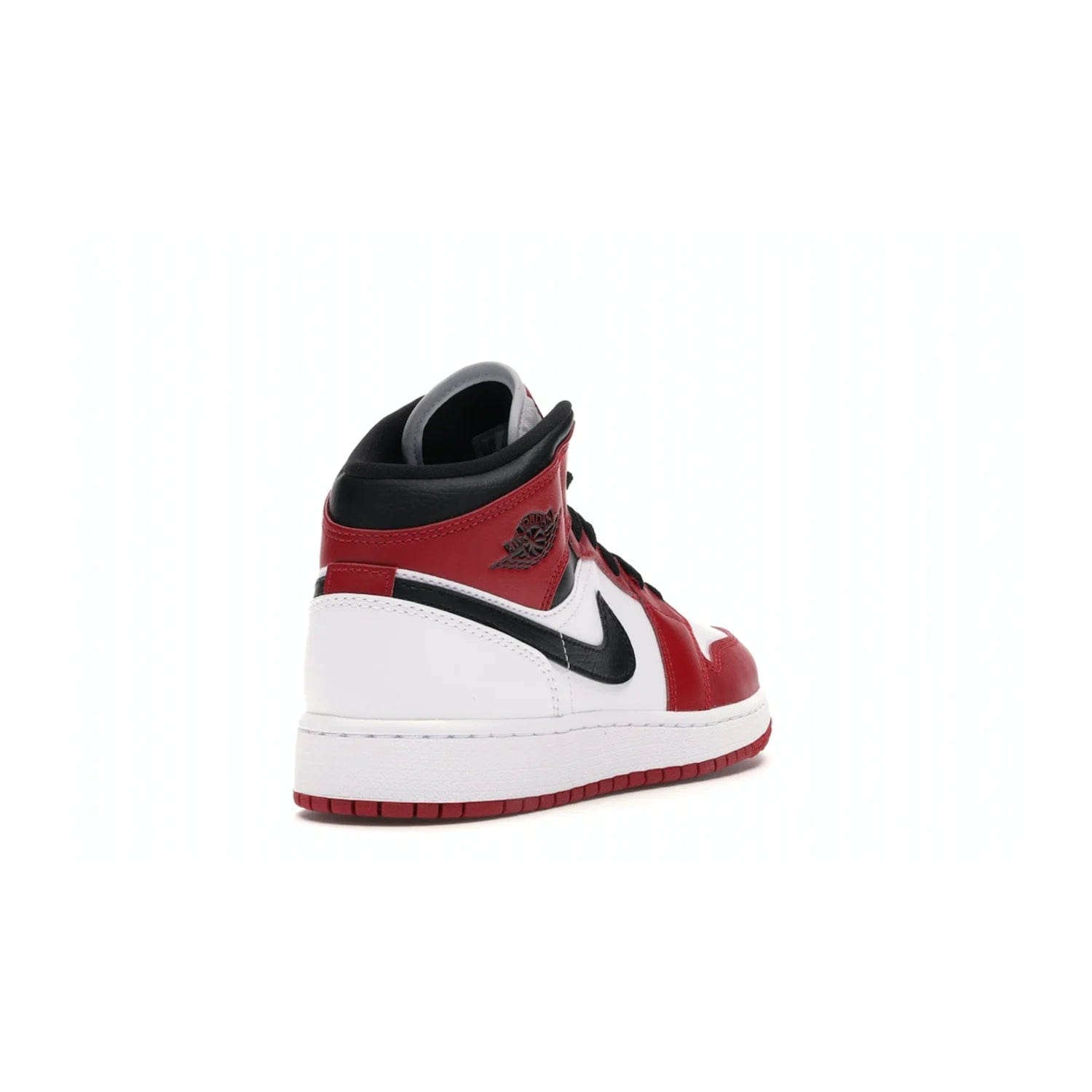 Jordan 1 Mid Chicago (2020) (GS) - Image 31 - Only at www.BallersClubKickz.com - The Kids Air Jordan 1 Mid Chicago 2020 is a stylish sneaker with classic Jordan features. White, red and black color scheme with iconic Wings and Swoosh logos, padded ankle support, white midsole with Air tech and black cotton laces. Sure to become an instant classic. July 2020 release.