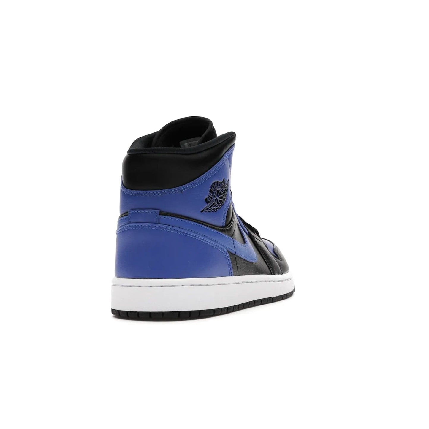 Jordan 1 Mid Hyper Royal Tumbled Leather - Image 30 - Only at www.BallersClubKickz.com - Iconic colorway of the Air Jordan 1 Mid Black Royal Tumbled Leather. Features a black tumbled leather upper, royal blue leather overlays, white midsole & black rubber outsole. Released December 2020. Adds premium style to any collection.