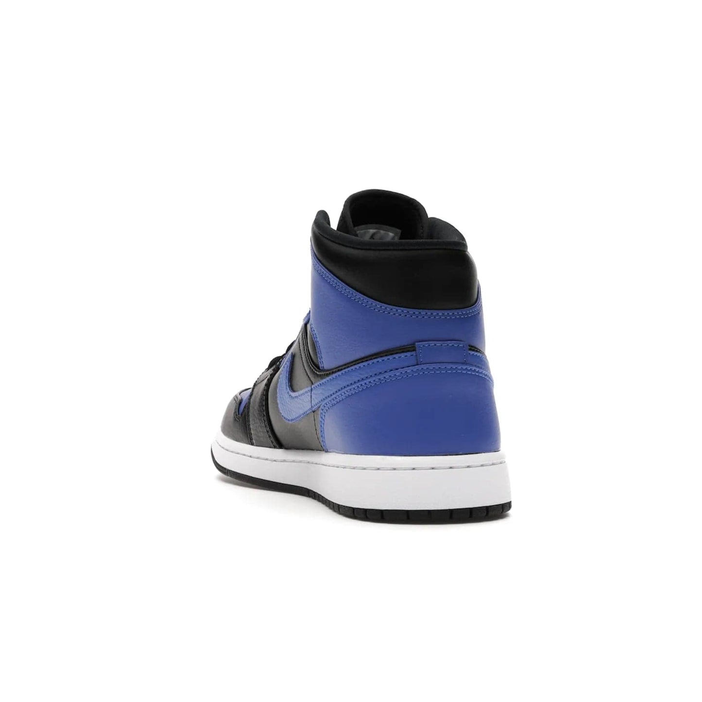 Jordan 1 Mid Hyper Royal Tumbled Leather - Image 26 - Only at www.BallersClubKickz.com - Iconic colorway of the Air Jordan 1 Mid Black Royal Tumbled Leather. Features a black tumbled leather upper, royal blue leather overlays, white midsole & black rubber outsole. Released December 2020. Adds premium style to any collection.