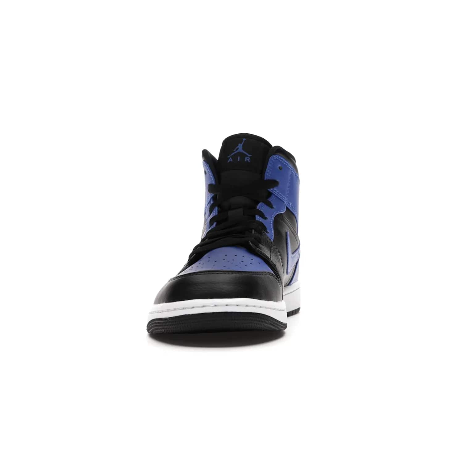 Jordan 1 Mid Hyper Royal Tumbled Leather - Image 11 - Only at www.BallersClubKickz.com - Iconic colorway of the Air Jordan 1 Mid Black Royal Tumbled Leather. Features a black tumbled leather upper, royal blue leather overlays, white midsole & black rubber outsole. Released December 2020. Adds premium style to any collection.
