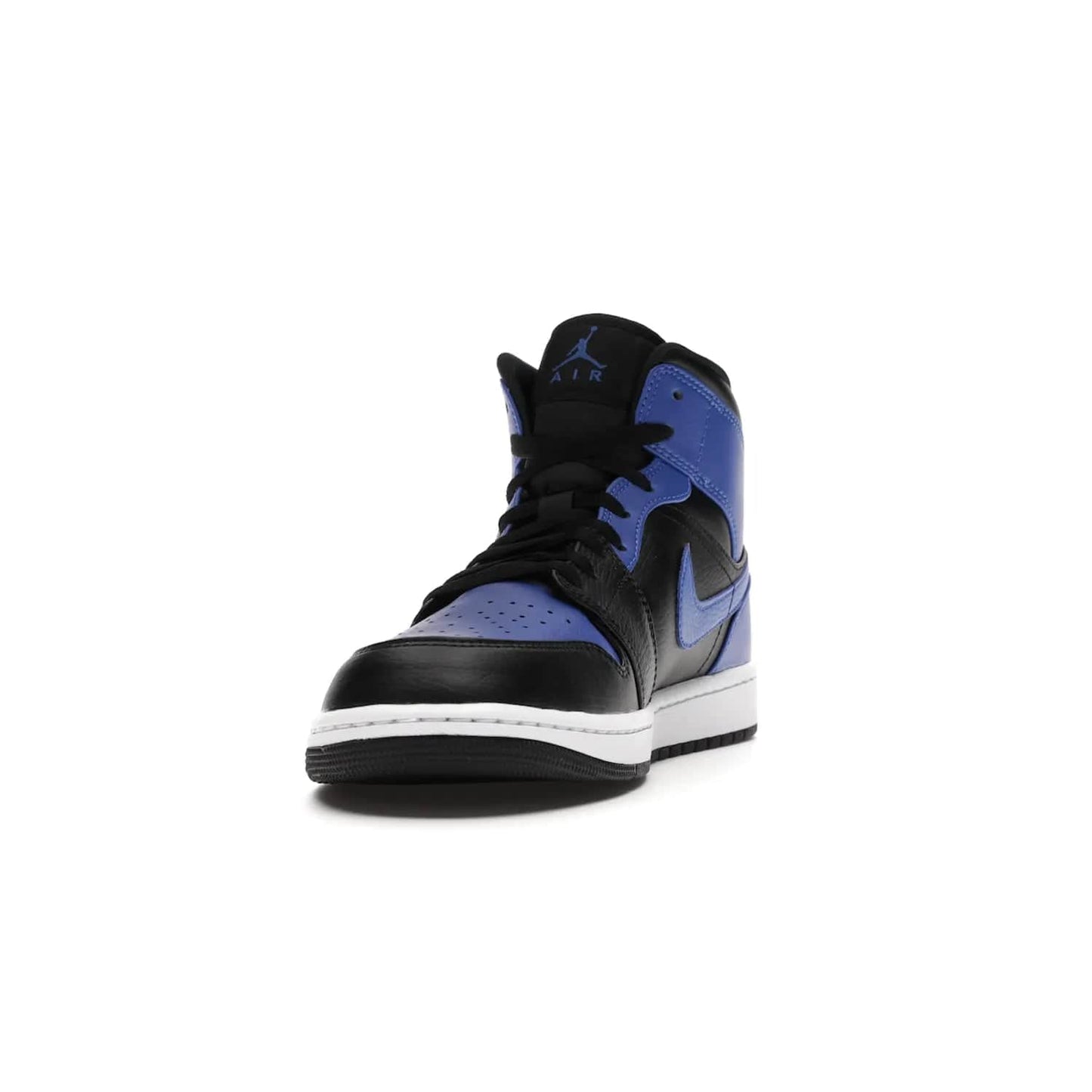 Jordan 1 Mid Hyper Royal Tumbled Leather - Image 12 - Only at www.BallersClubKickz.com - Iconic colorway of the Air Jordan 1 Mid Black Royal Tumbled Leather. Features a black tumbled leather upper, royal blue leather overlays, white midsole & black rubber outsole. Released December 2020. Adds premium style to any collection.