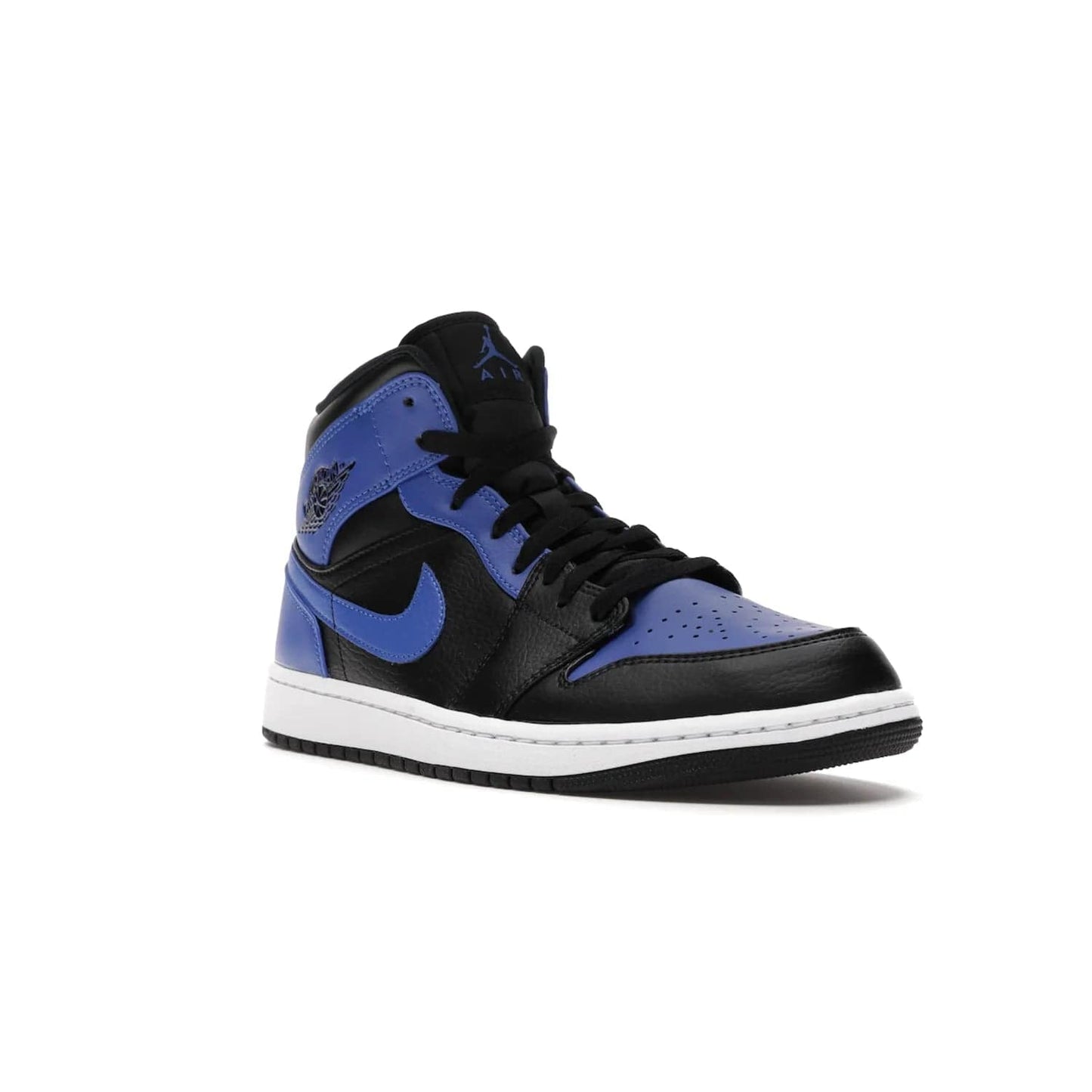 Jordan 1 Mid Hyper Royal Tumbled Leather - Image 6 - Only at www.BallersClubKickz.com - Iconic colorway of the Air Jordan 1 Mid Black Royal Tumbled Leather. Features a black tumbled leather upper, royal blue leather overlays, white midsole & black rubber outsole. Released December 2020. Adds premium style to any collection.