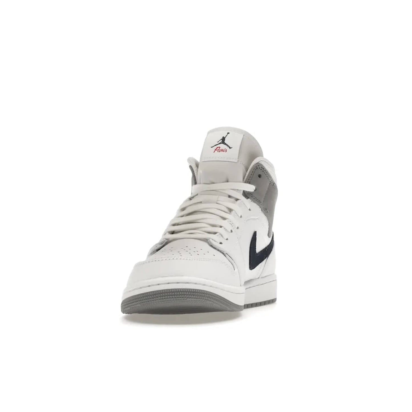 Jordan 1 Mid Paris White - Image 12 - Only at www.BallersClubKickz.com - Snag the Air Jordan 1 Mid Paris White to add a statement of sophistication to any sneaker collection. Featuring Nike swoosh logo in midnight navy suede and Jumpman symbol in University Red.