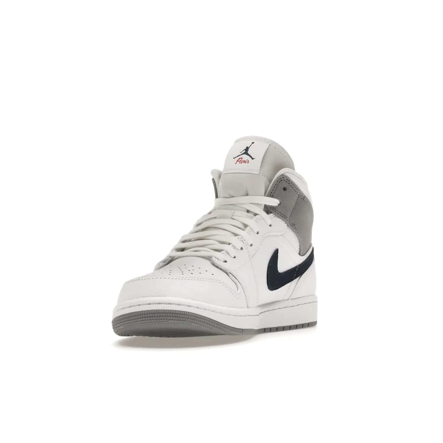 Jordan 1 Mid Paris White - Image 13 - Only at www.BallersClubKickz.com - Snag the Air Jordan 1 Mid Paris White to add a statement of sophistication to any sneaker collection. Featuring Nike swoosh logo in midnight navy suede and Jumpman symbol in University Red.