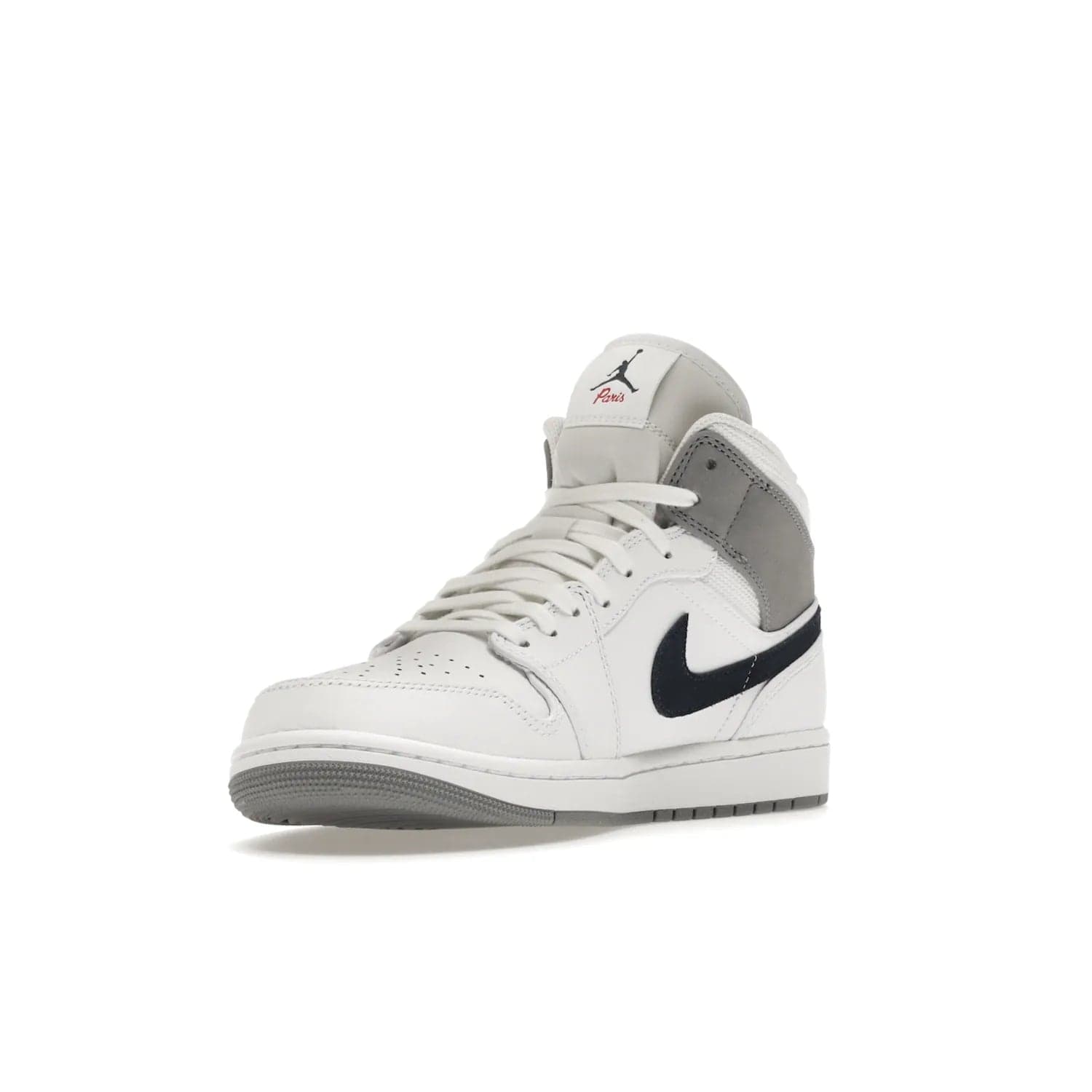 Jordan 1 Mid Paris White - Image 14 - Only at www.BallersClubKickz.com - Snag the Air Jordan 1 Mid Paris White to add a statement of sophistication to any sneaker collection. Featuring Nike swoosh logo in midnight navy suede and Jumpman symbol in University Red.