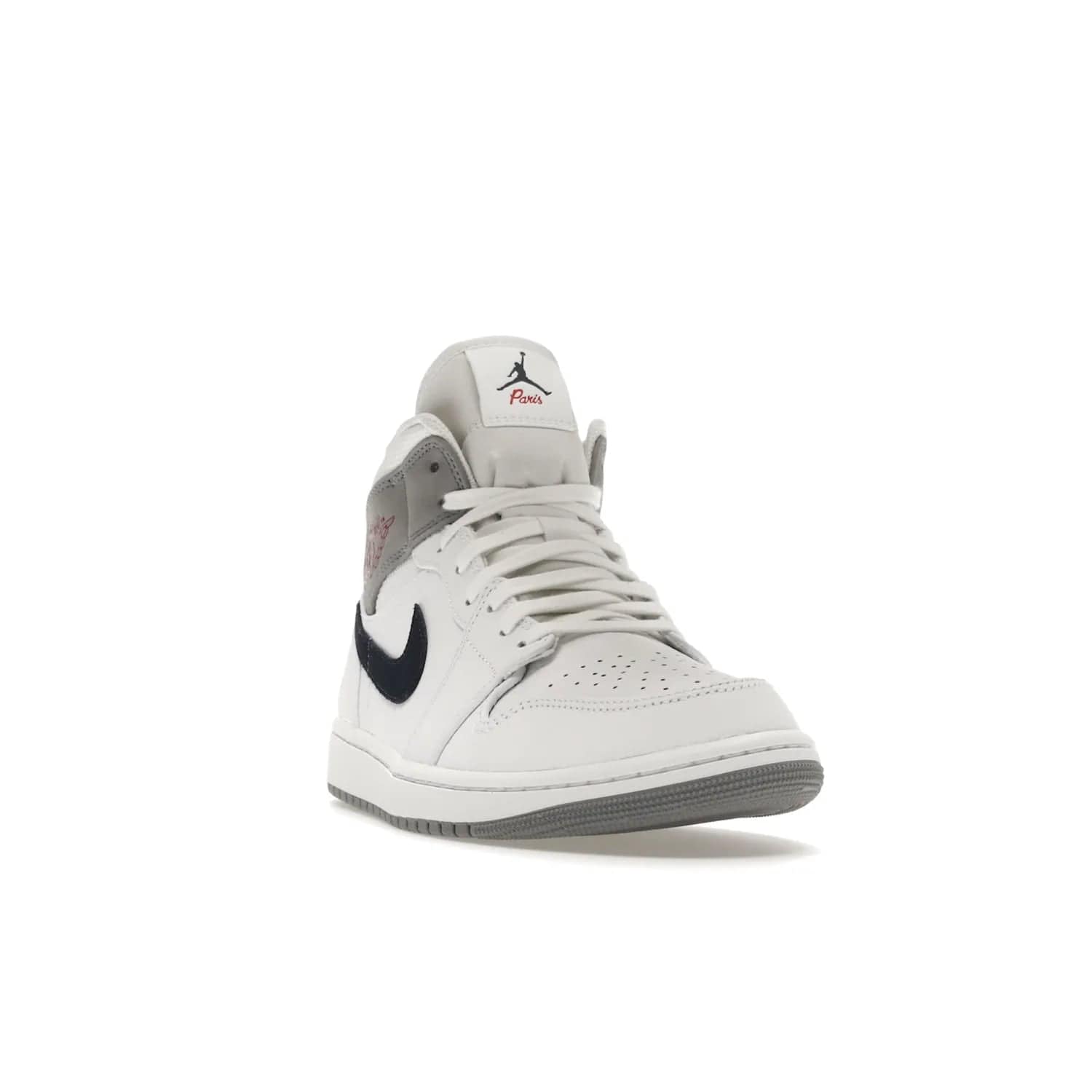 Jordan 1 Mid Paris White - Image 8 - Only at www.BallersClubKickz.com - Snag the Air Jordan 1 Mid Paris White to add a statement of sophistication to any sneaker collection. Featuring Nike swoosh logo in midnight navy suede and Jumpman symbol in University Red.