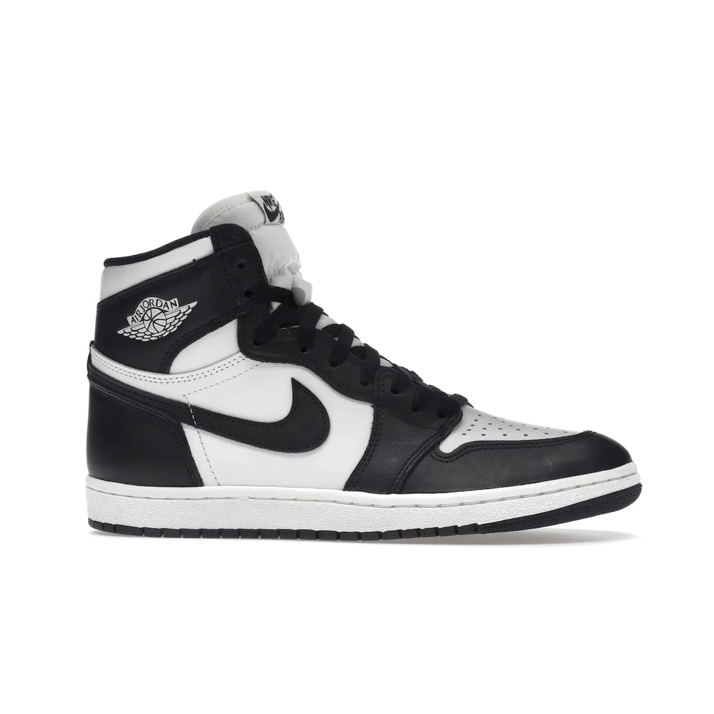 Jordan 1 Retro High 85 Black White (2023) - Image 2 - Only at www.BallersClubKickz.com - Brand new Jordan 1 Retro High 85 Black White (2023) now available. A classic color scheme of black and white leather uppers with signature Nike Air logo on the tongue. Must-have for any Air Jordan fan. Available February 15, 2023.