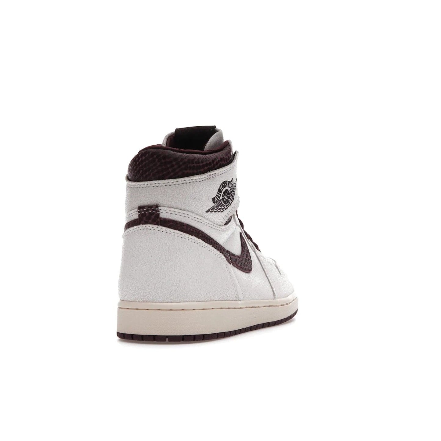 Jordan 1 Retro High OG A Ma Maniére - Image 30 - Only at www.BallersClubKickz.com - Luxury meets style with the Air Jordan 1 A Ma Maniére. Premium leather, reptilian-textured leather collars and Swooshes, quilted lining, and yellowed soles come together to create a vintage yet modern sneaker, perfect for any occasion. Released in November 2021.
