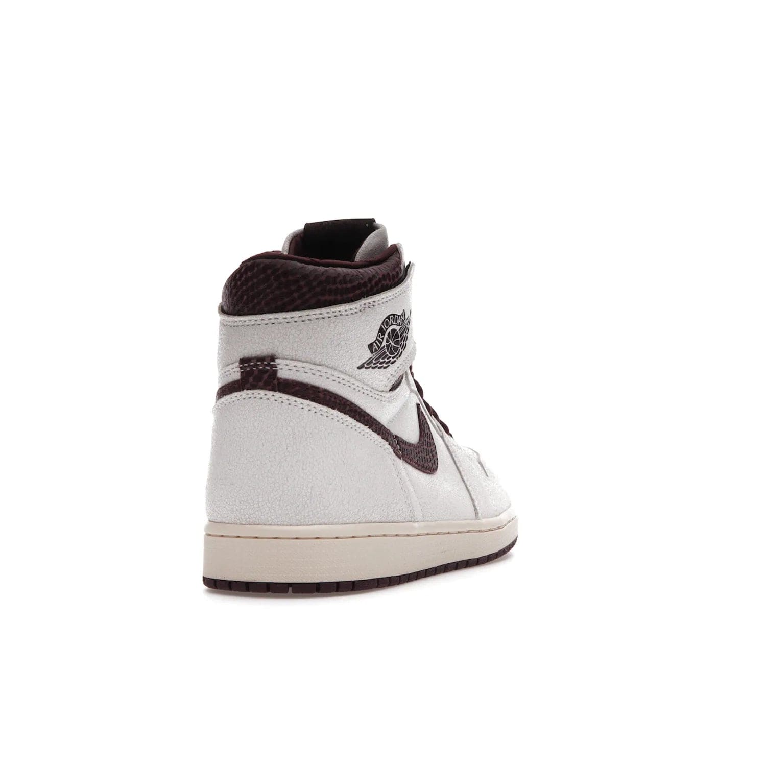Jordan 1 Retro High OG A Ma Maniére - Image 30 - Only at www.BallersClubKickz.com - Luxury meets style with the Air Jordan 1 A Ma Maniére. Premium leather, reptilian-textured leather collars and Swooshes, quilted lining, and yellowed soles come together to create a vintage yet modern sneaker, perfect for any occasion. Released in November 2021.