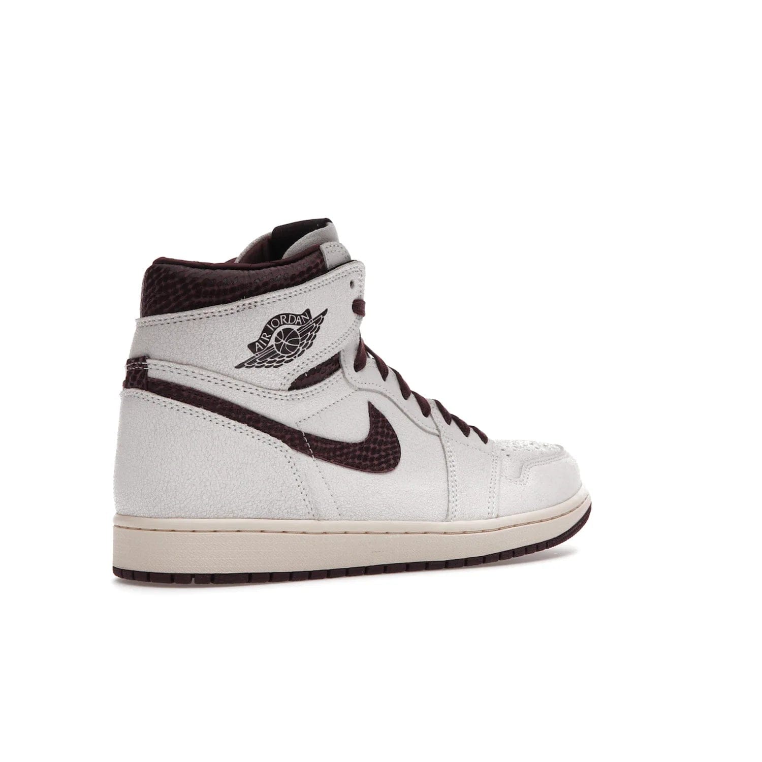 Jordan 1 Retro High OG A Ma Maniére - Image 33 - Only at www.BallersClubKickz.com - Luxury meets style with the Air Jordan 1 A Ma Maniére. Premium leather, reptilian-textured leather collars and Swooshes, quilted lining, and yellowed soles come together to create a vintage yet modern sneaker, perfect for any occasion. Released in November 2021.