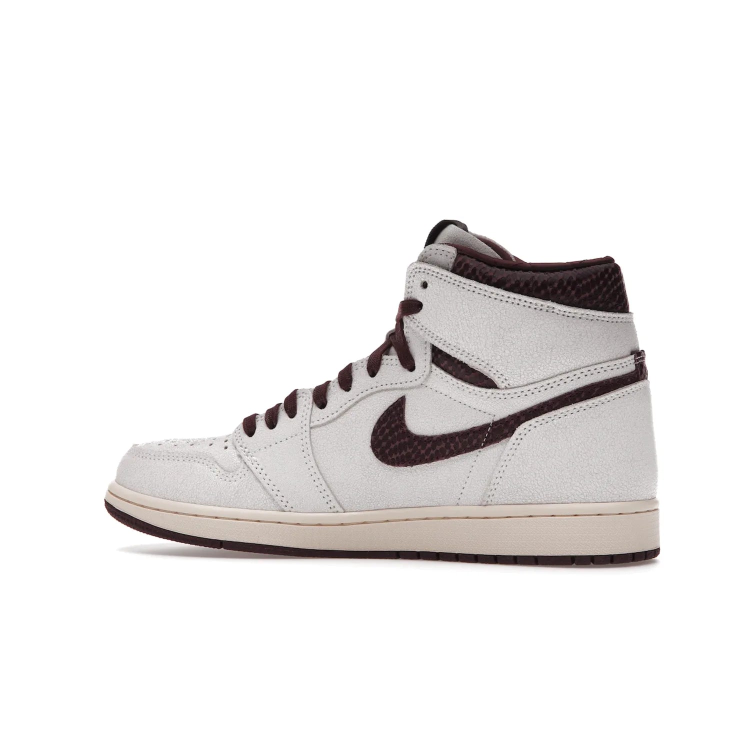 Jordan 1 Retro High OG A Ma Maniére - Image 21 - Only at www.BallersClubKickz.com - Luxury meets style with the Air Jordan 1 A Ma Maniére. Premium leather, reptilian-textured leather collars and Swooshes, quilted lining, and yellowed soles come together to create a vintage yet modern sneaker, perfect for any occasion. Released in November 2021.