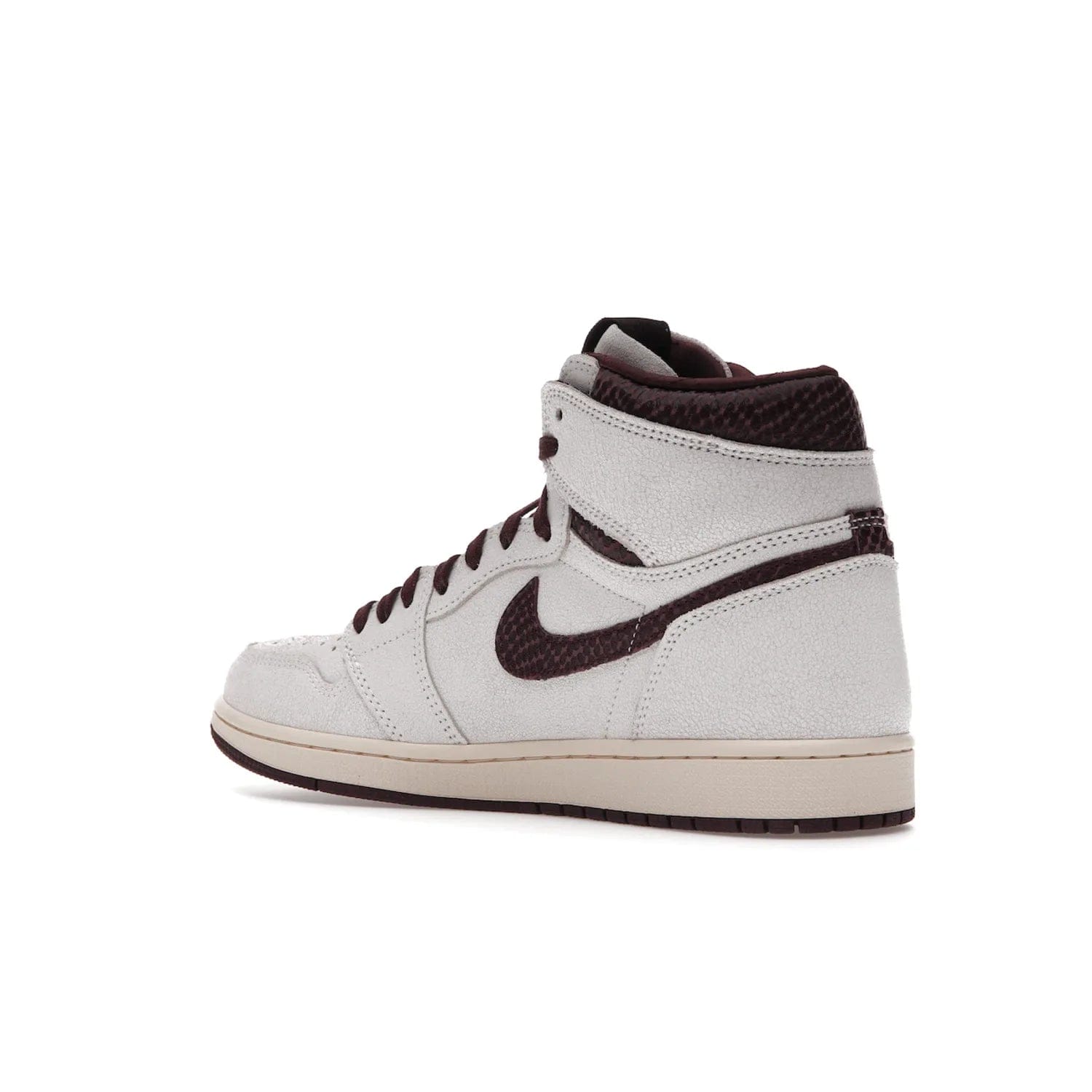 Jordan 1 Retro High OG A Ma Maniére - Image 23 - Only at www.BallersClubKickz.com - Luxury meets style with the Air Jordan 1 A Ma Maniére. Premium leather, reptilian-textured leather collars and Swooshes, quilted lining, and yellowed soles come together to create a vintage yet modern sneaker, perfect for any occasion. Released in November 2021.