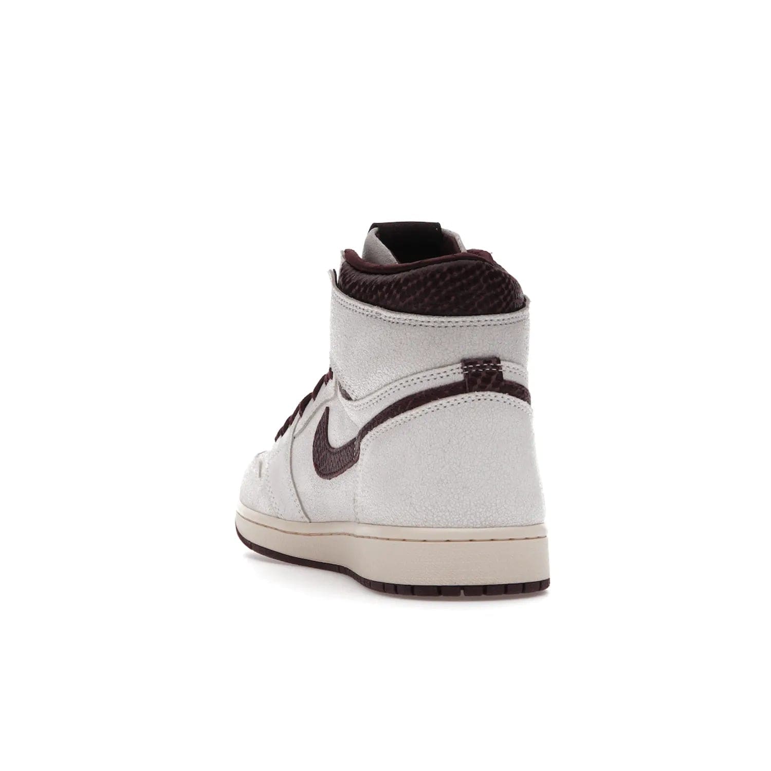 Jordan 1 Retro High OG A Ma Maniére - Image 26 - Only at www.BallersClubKickz.com - Luxury meets style with the Air Jordan 1 A Ma Maniére. Premium leather, reptilian-textured leather collars and Swooshes, quilted lining, and yellowed soles come together to create a vintage yet modern sneaker, perfect for any occasion. Released in November 2021.