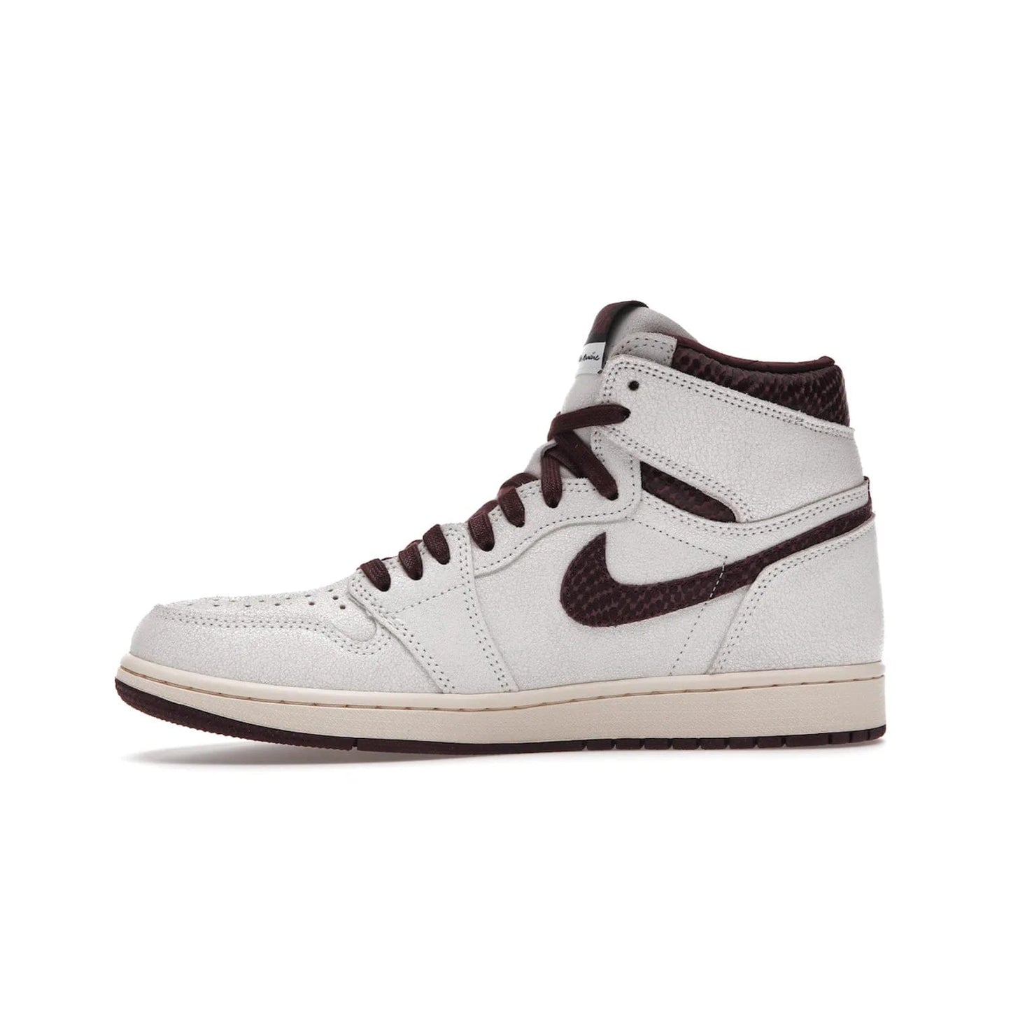 Jordan 1 Retro High OG A Ma Maniére - Image 18 - Only at www.BallersClubKickz.com - Luxury meets style with the Air Jordan 1 A Ma Maniére. Premium leather, reptilian-textured leather collars and Swooshes, quilted lining, and yellowed soles come together to create a vintage yet modern sneaker, perfect for any occasion. Released in November 2021.