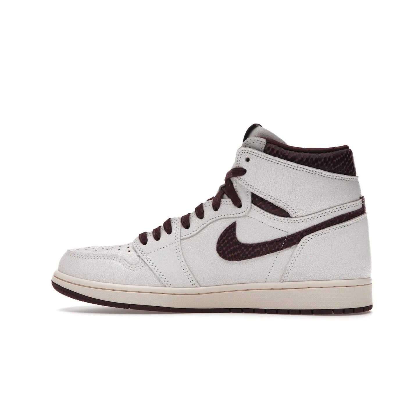 Jordan 1 Retro High OG A Ma Maniére - Image 20 - Only at www.BallersClubKickz.com - Luxury meets style with the Air Jordan 1 A Ma Maniére. Premium leather, reptilian-textured leather collars and Swooshes, quilted lining, and yellowed soles come together to create a vintage yet modern sneaker, perfect for any occasion. Released in November 2021.