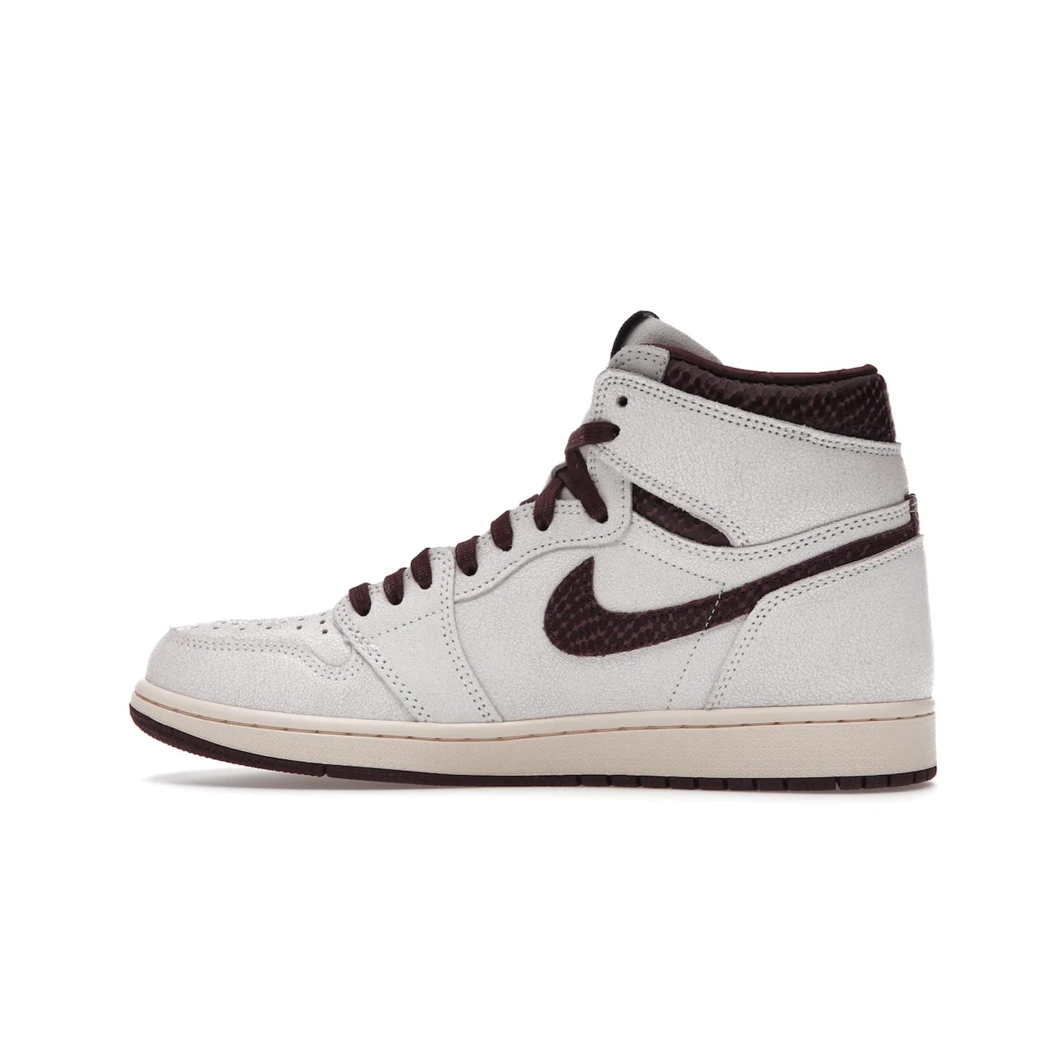 Jordan 1 Retro High OG A Ma Maniére - Image 20 - Only at www.BallersClubKickz.com - Luxury meets style with the Air Jordan 1 A Ma Maniére. Premium leather, reptilian-textured leather collars and Swooshes, quilted lining, and yellowed soles come together to create a vintage yet modern sneaker, perfect for any occasion. Released in November 2021.
