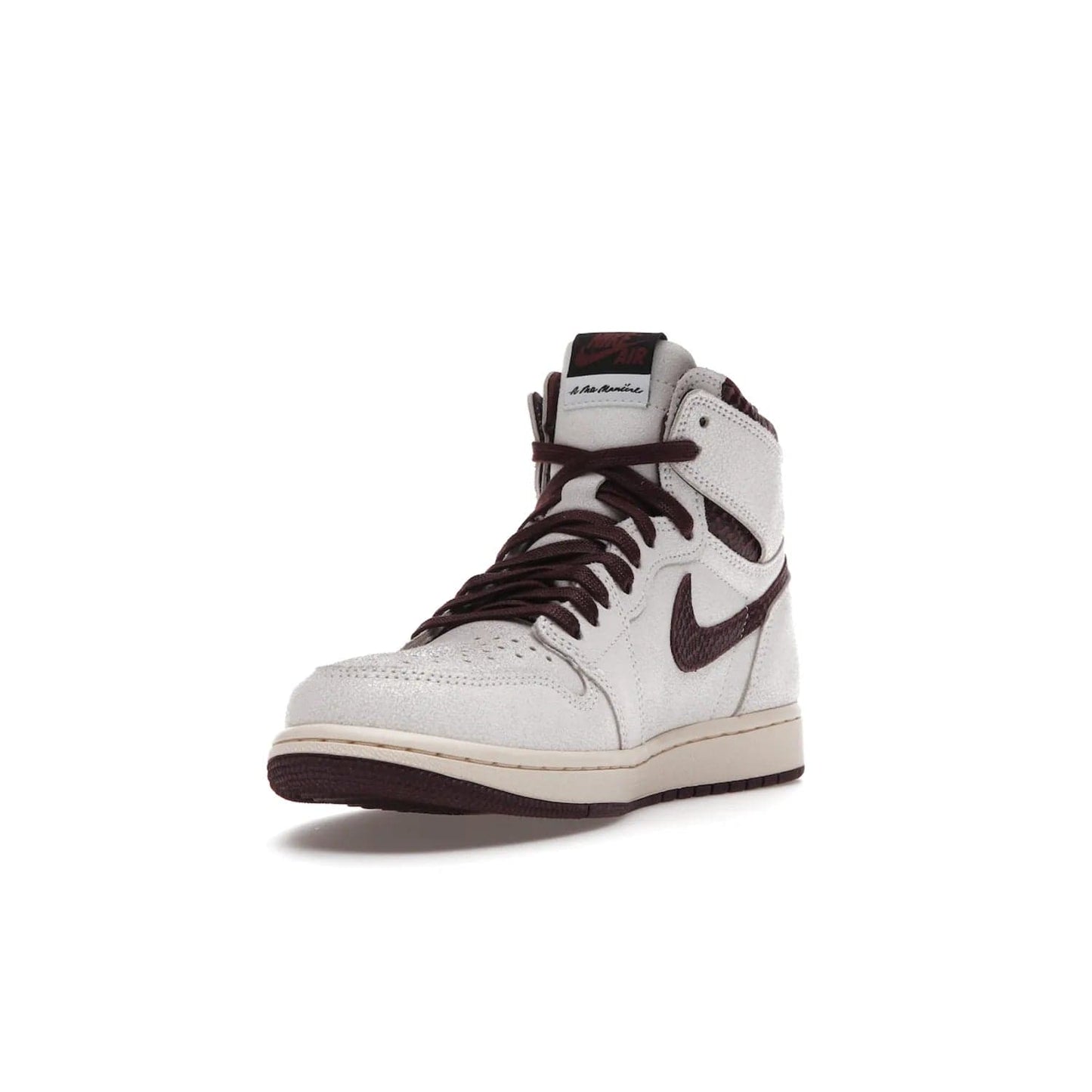 Jordan 1 Retro High OG A Ma Maniére - Image 13 - Only at www.BallersClubKickz.com - Luxury meets style with the Air Jordan 1 A Ma Maniére. Premium leather, reptilian-textured leather collars and Swooshes, quilted lining, and yellowed soles come together to create a vintage yet modern sneaker, perfect for any occasion. Released in November 2021.
