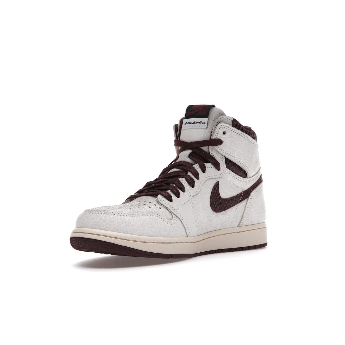 Jordan 1 Retro High OG A Ma Maniére - Image 14 - Only at www.BallersClubKickz.com - Luxury meets style with the Air Jordan 1 A Ma Maniére. Premium leather, reptilian-textured leather collars and Swooshes, quilted lining, and yellowed soles come together to create a vintage yet modern sneaker, perfect for any occasion. Released in November 2021.