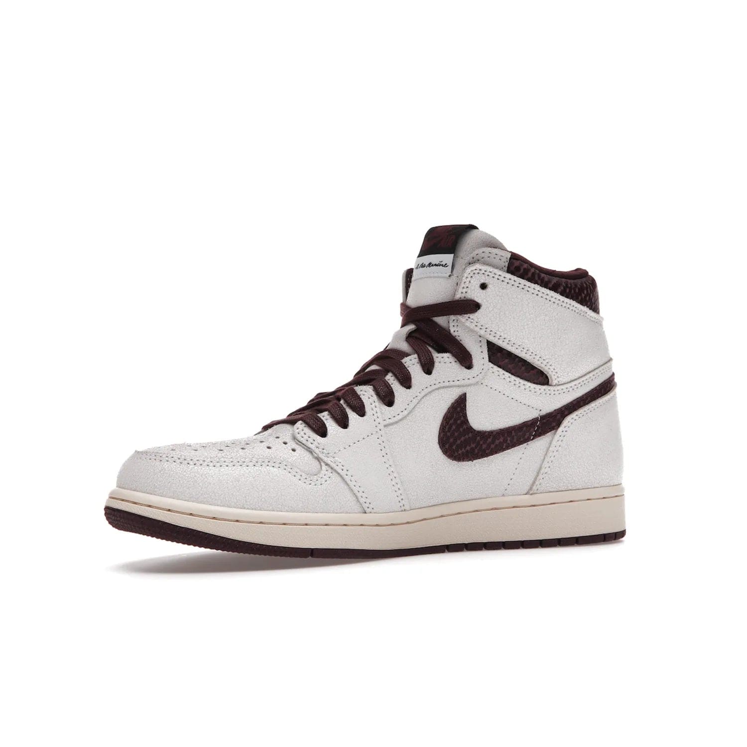 Jordan 1 Retro High OG A Ma Maniére - Image 16 - Only at www.BallersClubKickz.com - Luxury meets style with the Air Jordan 1 A Ma Maniére. Premium leather, reptilian-textured leather collars and Swooshes, quilted lining, and yellowed soles come together to create a vintage yet modern sneaker, perfect for any occasion. Released in November 2021.
