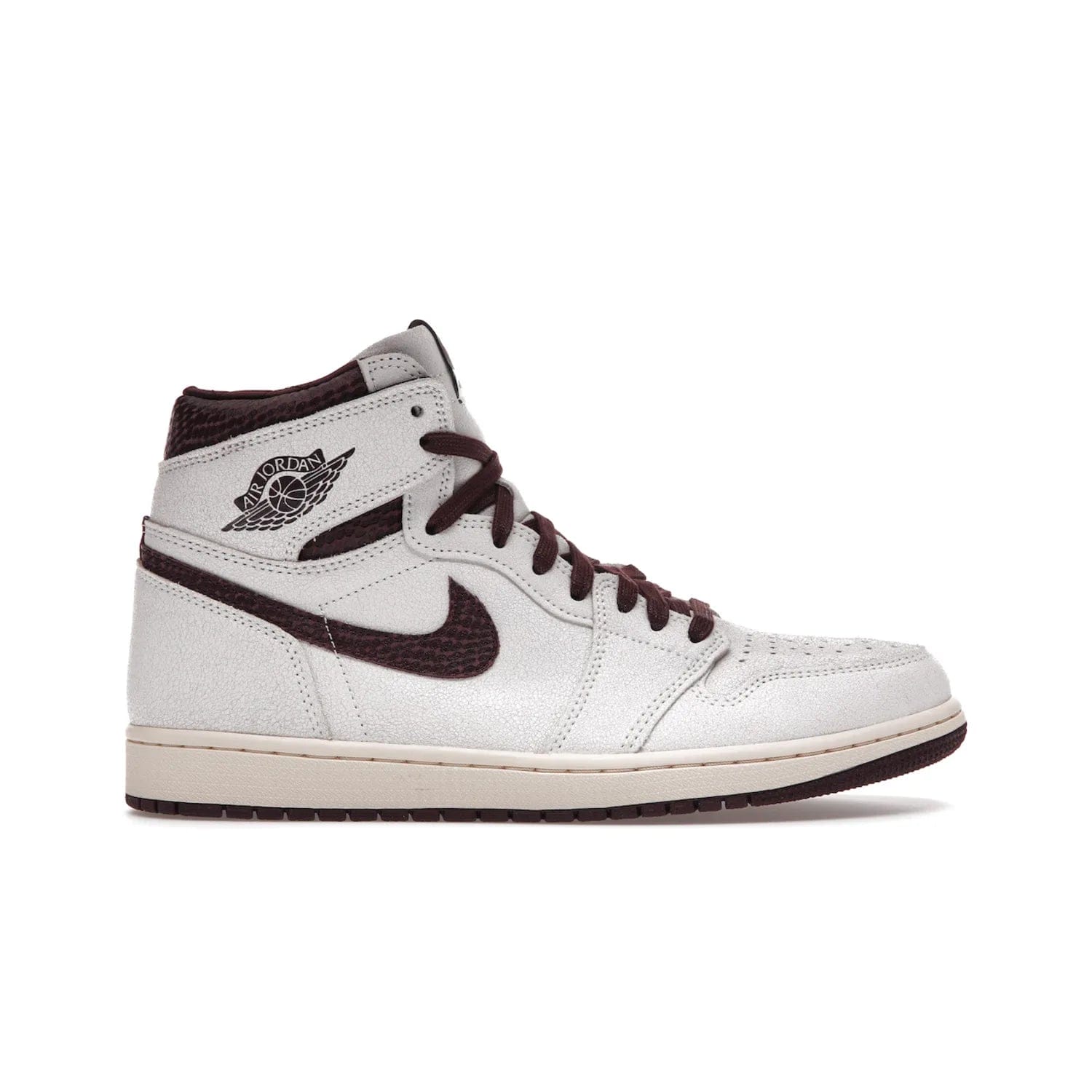 Jordan 1 Retro High OG A Ma Maniére - Image 1 - Only at www.BallersClubKickz.com - Luxury meets style with the Air Jordan 1 A Ma Maniére. Premium leather, reptilian-textured leather collars and Swooshes, quilted lining, and yellowed soles come together to create a vintage yet modern sneaker, perfect for any occasion. Released in November 2021.