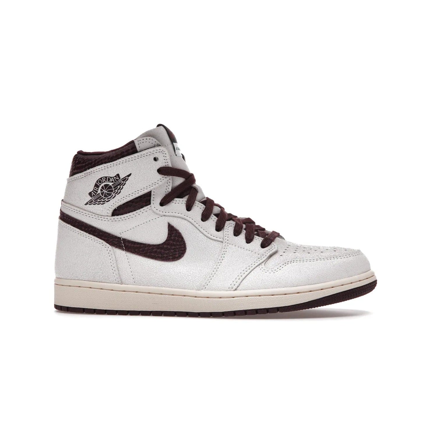 Jordan 1 Retro High OG A Ma Maniére - Image 2 - Only at www.BallersClubKickz.com - Luxury meets style with the Air Jordan 1 A Ma Maniére. Premium leather, reptilian-textured leather collars and Swooshes, quilted lining, and yellowed soles come together to create a vintage yet modern sneaker, perfect for any occasion. Released in November 2021.