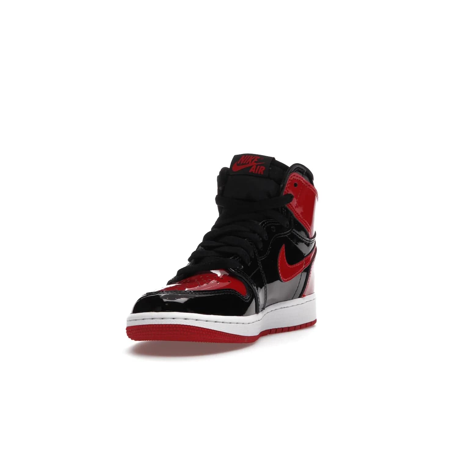 Jordan 1 Retro High OG Patent Bred (GS) - Image 13 - Only at www.BallersClubKickz.com - Upgrade your sneaker game with the iconic Air Jordan 1 Retro High OG Bred Patent GS. Crafted with premium patent leather and basketball-inspired details for a classic look, they also feature an encapsulated Air-sole cushioning and enhanced red rubber outsole. Don't miss this timeless sneaker with a striking black, white, and varsity red colorway, dropping December 2021.