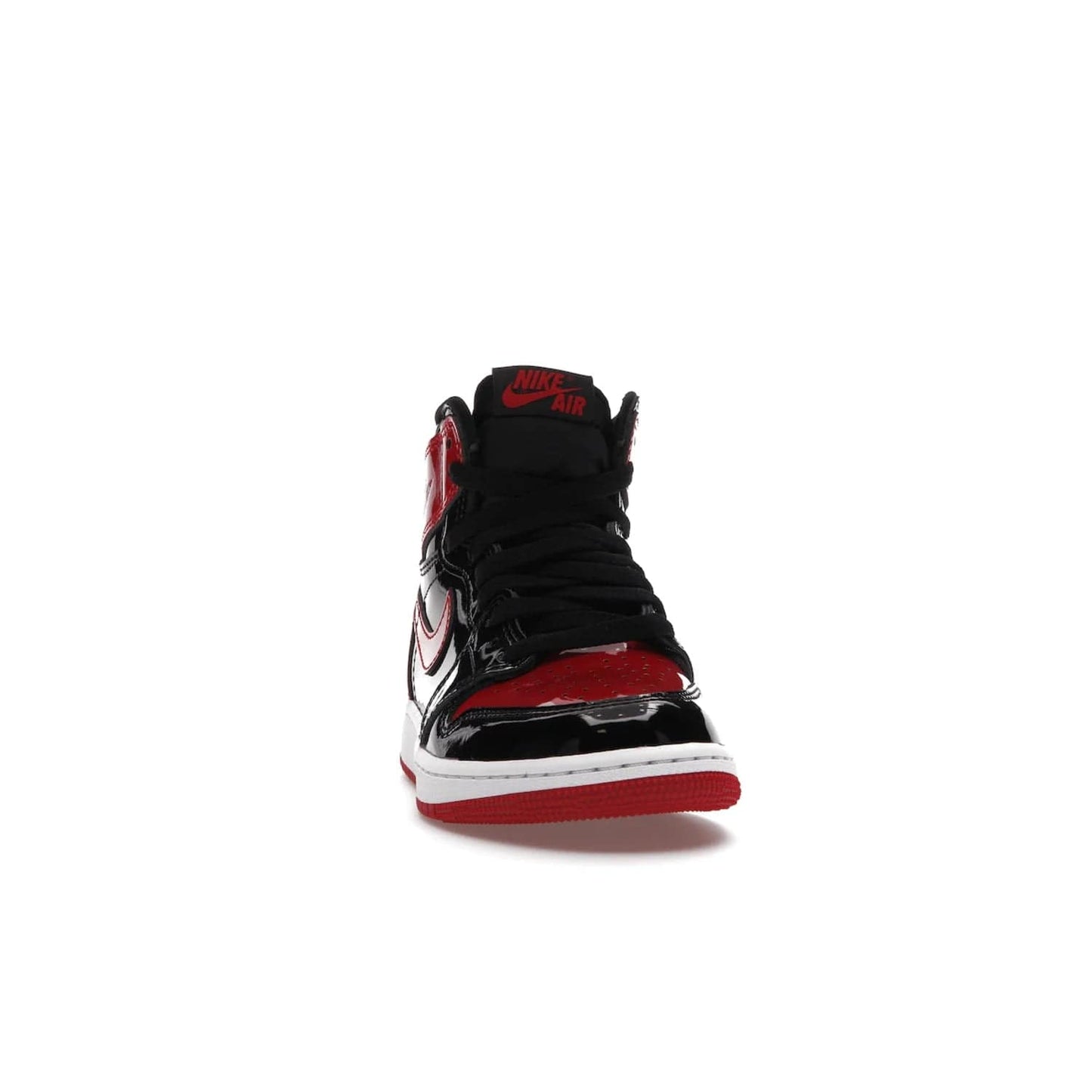 Jordan 1 Retro High OG Patent Bred (GS) - Image 9 - Only at www.BallersClubKickz.com - Upgrade your sneaker game with the iconic Air Jordan 1 Retro High OG Bred Patent GS. Crafted with premium patent leather and basketball-inspired details for a classic look, they also feature an encapsulated Air-sole cushioning and enhanced red rubber outsole. Don't miss this timeless sneaker with a striking black, white, and varsity red colorway, dropping December 2021.