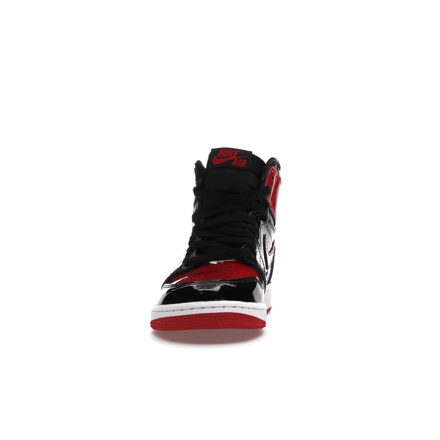 Jordan 1 Retro High OG Patent Bred (GS) - Image 11 - Only at www.BallersClubKickz.com - Upgrade your sneaker game with the iconic Air Jordan 1 Retro High OG Bred Patent GS. Crafted with premium patent leather and basketball-inspired details for a classic look, they also feature an encapsulated Air-sole cushioning and enhanced red rubber outsole. Don't miss this timeless sneaker with a striking black, white, and varsity red colorway, dropping December 2021.