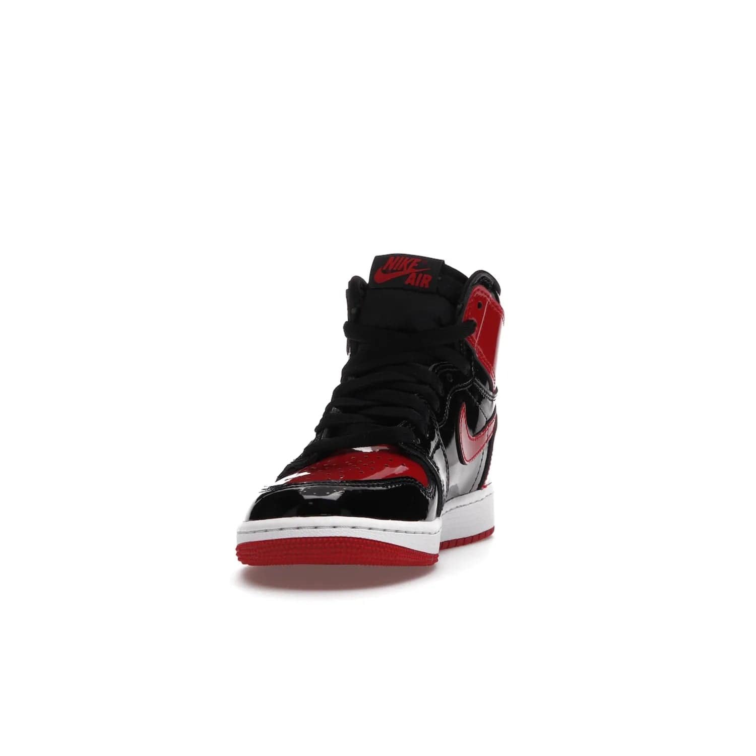 Jordan 1 Retro High OG Patent Bred (GS) - Image 12 - Only at www.BallersClubKickz.com - Upgrade your sneaker game with the iconic Air Jordan 1 Retro High OG Bred Patent GS. Crafted with premium patent leather and basketball-inspired details for a classic look, they also feature an encapsulated Air-sole cushioning and enhanced red rubber outsole. Don't miss this timeless sneaker with a striking black, white, and varsity red colorway, dropping December 2021.