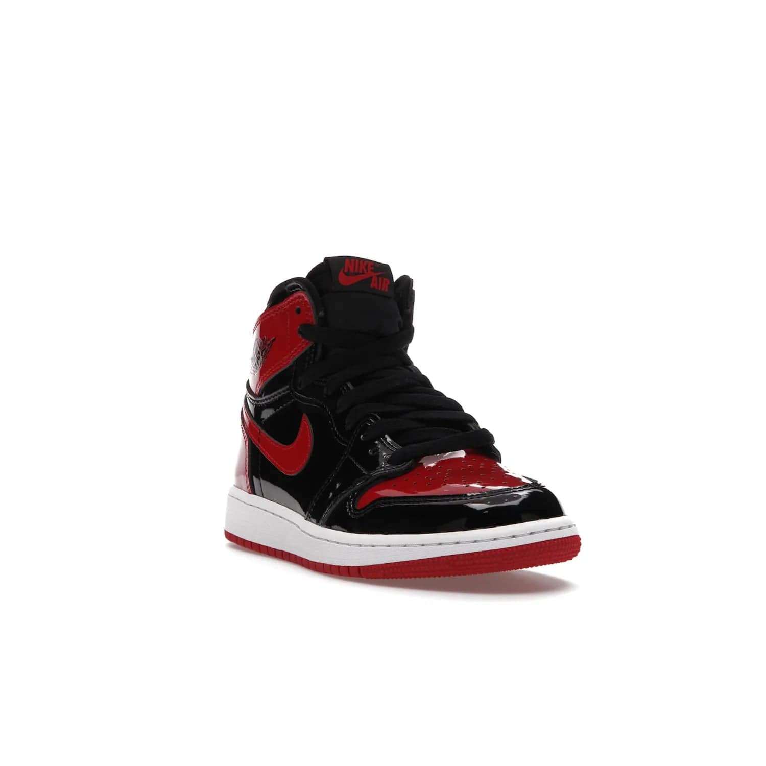 Jordan 1 Retro High OG Patent Bred (GS) - Image 7 - Only at www.BallersClubKickz.com - Upgrade your sneaker game with the iconic Air Jordan 1 Retro High OG Bred Patent GS. Crafted with premium patent leather and basketball-inspired details for a classic look, they also feature an encapsulated Air-sole cushioning and enhanced red rubber outsole. Don't miss this timeless sneaker with a striking black, white, and varsity red colorway, dropping December 2021.