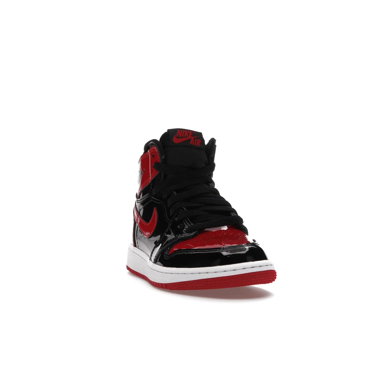 Jordan 1 Retro High OG Patent Bred (GS) - Image 8 - Only at www.BallersClubKickz.com - Upgrade your sneaker game with the iconic Air Jordan 1 Retro High OG Bred Patent GS. Crafted with premium patent leather and basketball-inspired details for a classic look, they also feature an encapsulated Air-sole cushioning and enhanced red rubber outsole. Don't miss this timeless sneaker with a striking black, white, and varsity red colorway, dropping December 2021.