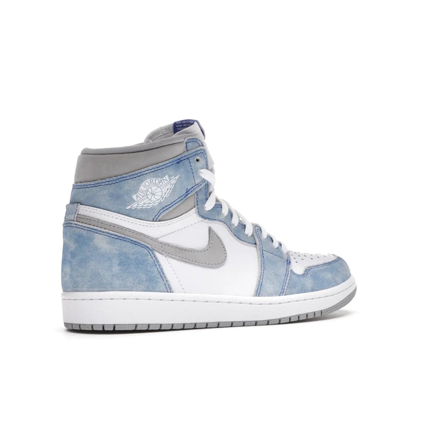 Jordan 1 Retro High OG Hyper Royal - Image 34 - Only at www.BallersClubKickz.com - A classic design with modern materials, the Air Jordan 1 Retro High OG Hyper Royal features Hyper Royal suede, Light Smoke Grey Durabuck Swoosh and ankle panels, a woven Nike Air label and a crisp white "Wings" logo. Released in April 2021.