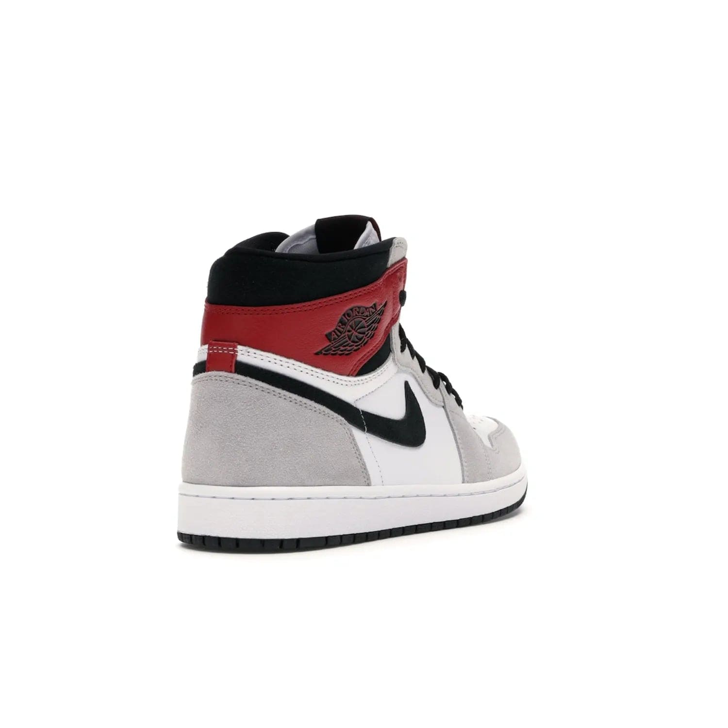 Jordan 1 Retro High Light Smoke Grey - Image 31 - Only at www.BallersClubKickz.com - Comfortable and stylish, Jordan 1 Retro High Light Smoke Grey offers a unique spin on a classic design. White leather, grey suede, red leather and black details are set on a white midsole and black outsole. Get the sneaker released in July 2020 and add a twist to your wardrobe.