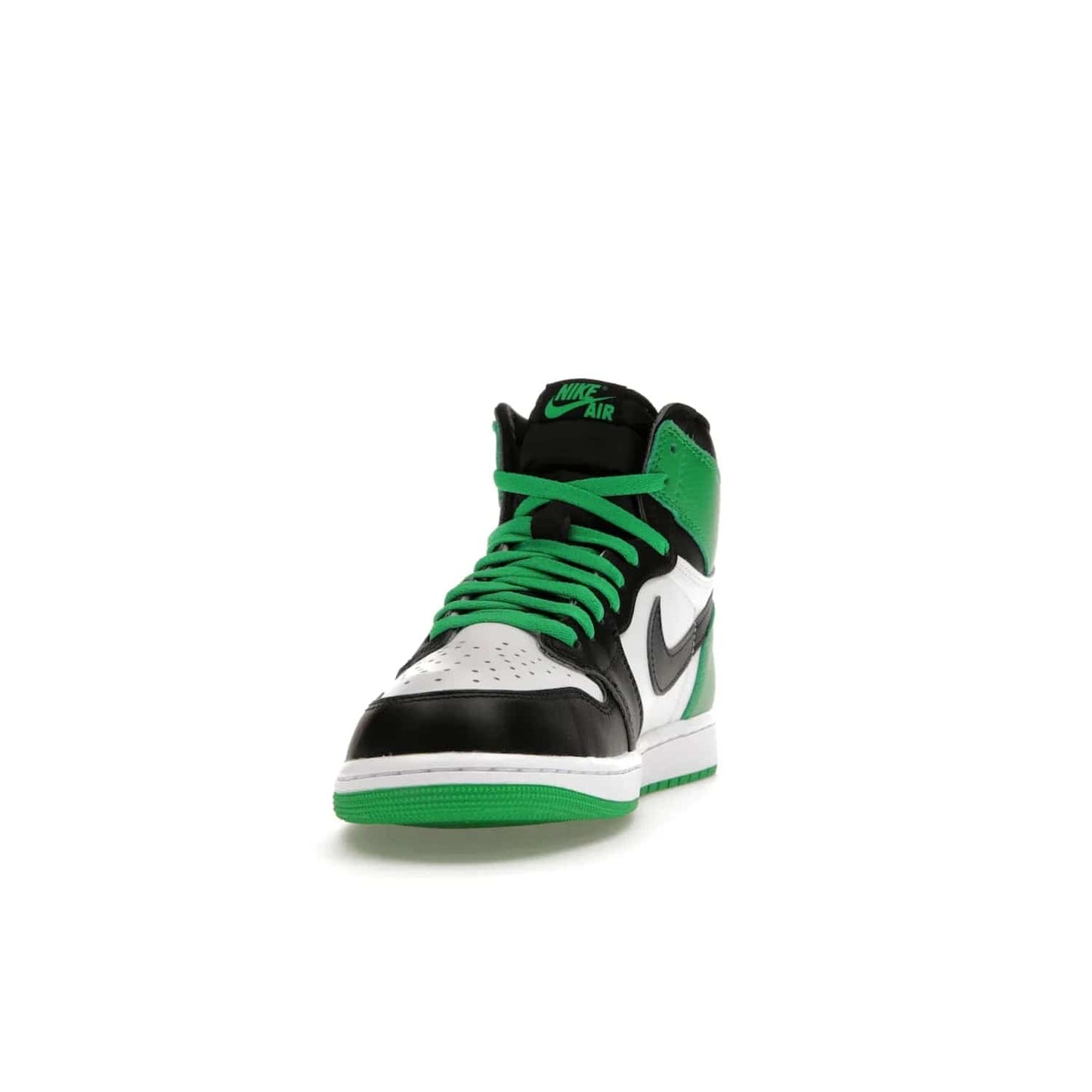 Jordan 1 Retro High OG Lucky Green - Image 12 - Only at www.BallersClubKickz.com - Experience luck with the release of the Air Jordan 1 Retro High OG Lucky Green. A leather upper with black, white and signature green accents hits the mark. Nike branding in Lucky Green and laces complete the look. Get lucky April 15, 2023.