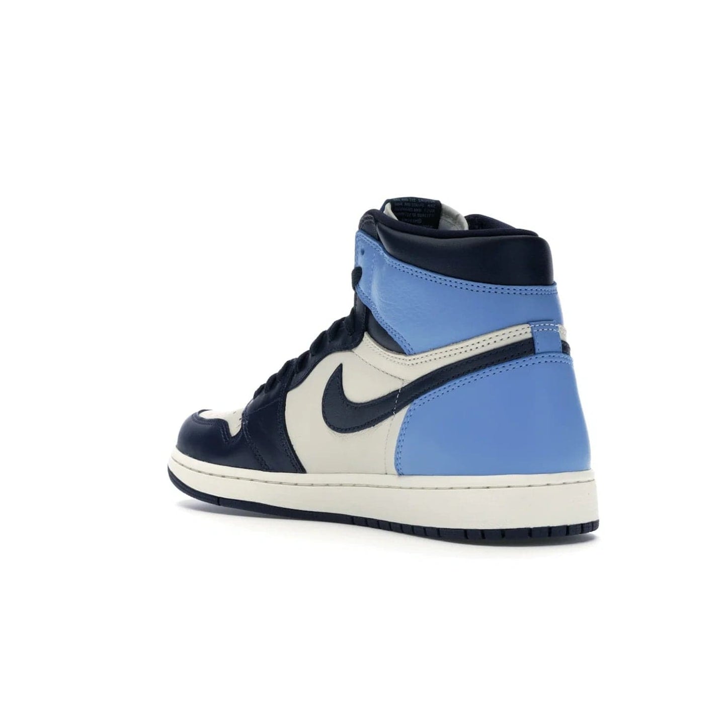 Jordan 1 Retro High Obsidian UNC - Image 24 - Only at www.BallersClubKickz.com - Bring a timeless classic to your wardrobe with the Air Jordan 1 Retro High "Obsidian/University Blue”. A full leather upper combines Obsidian and University Blue detailing for a retro Jordan style. Stitched Jumpman logo pays tribute to UNC. Experience classic style with a timeless sneaker.
